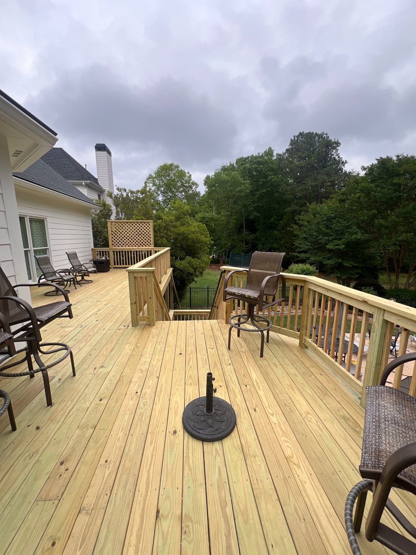 Multi-Level Pressure-Treated Wood Deck and Screened Porch in Acworth by Swift Home Renovations