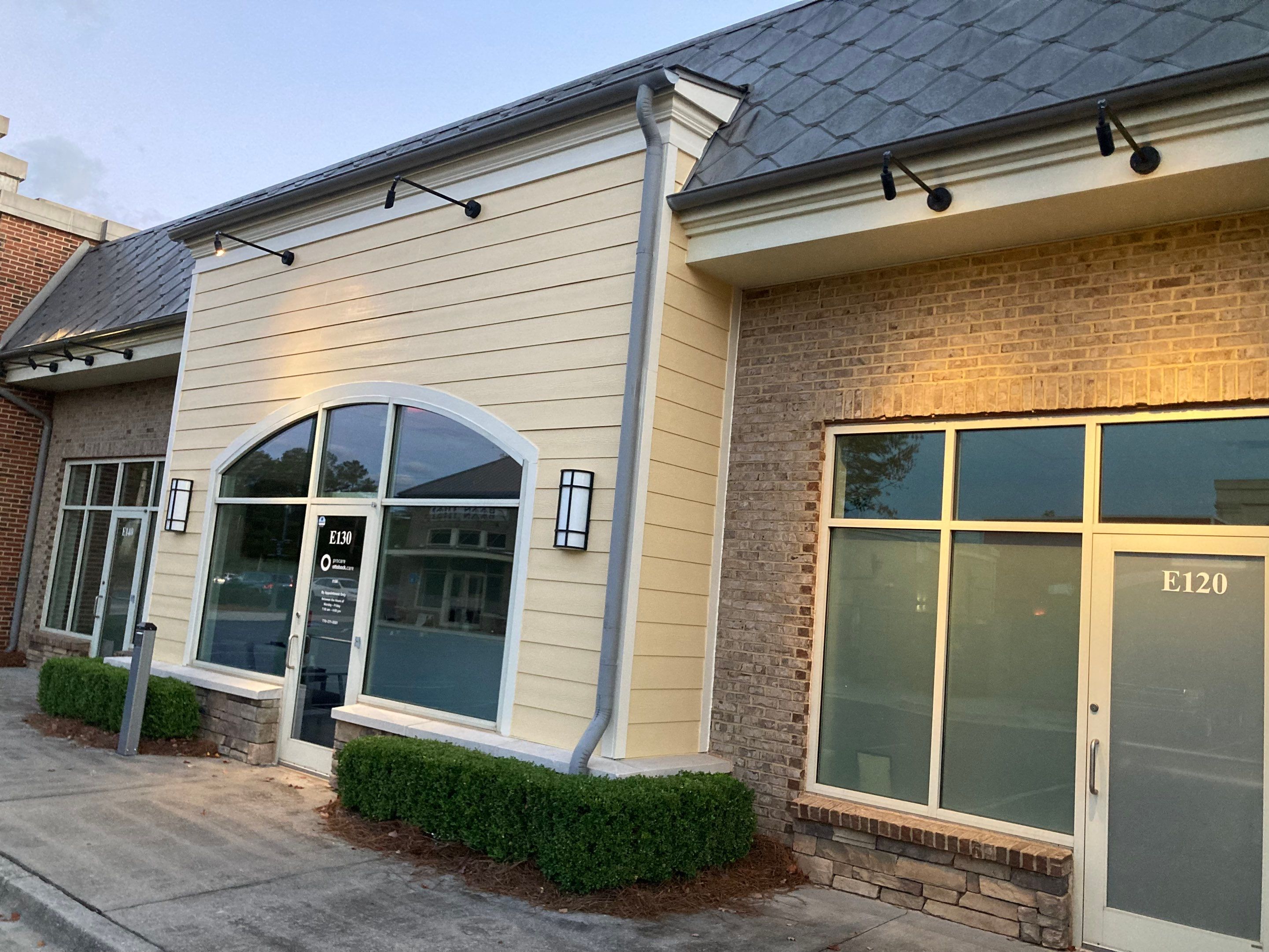 Commercial Exterior & Stairwell Painting – Corner Market by PGP Surface Solutions, LLC