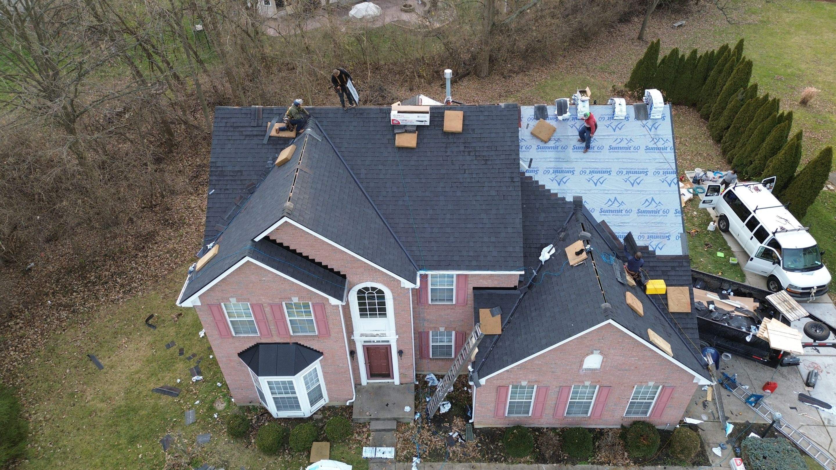 Walden Ponds - Pristine Black and Hydro Flo Gutter Guards by Tamlin Roofing