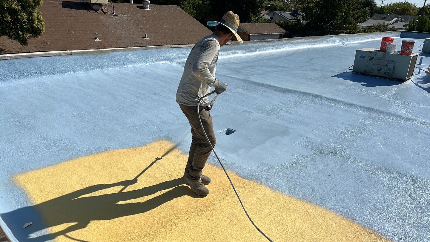Foam Refurbish using Conklin Benchmark/PUMA XL coatings and spray foam; Also metal roofing around parapet wall by Straight Edge Roofing Inc