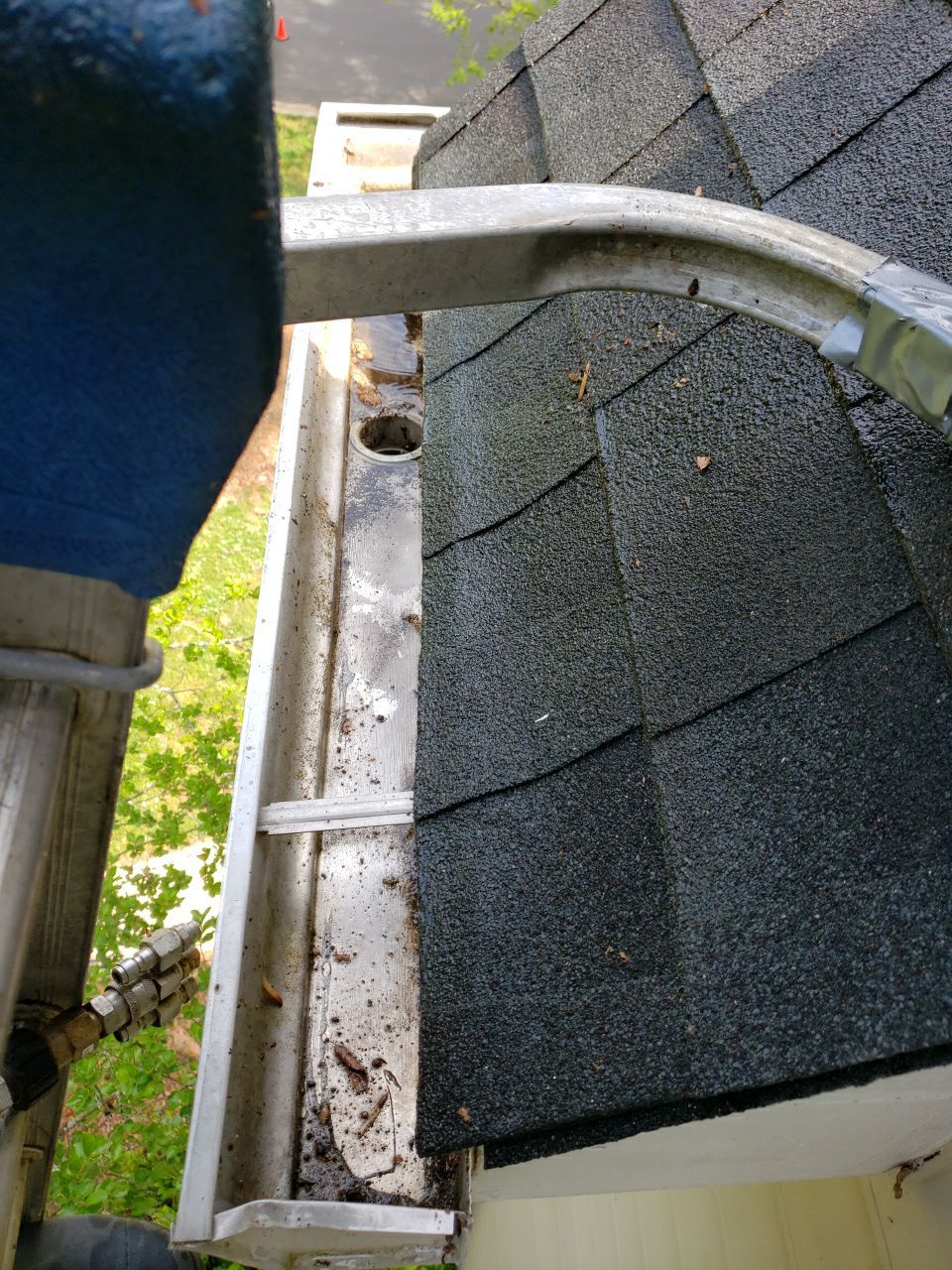 Gutter Cleaning using water by Power Wash Masters LLC
