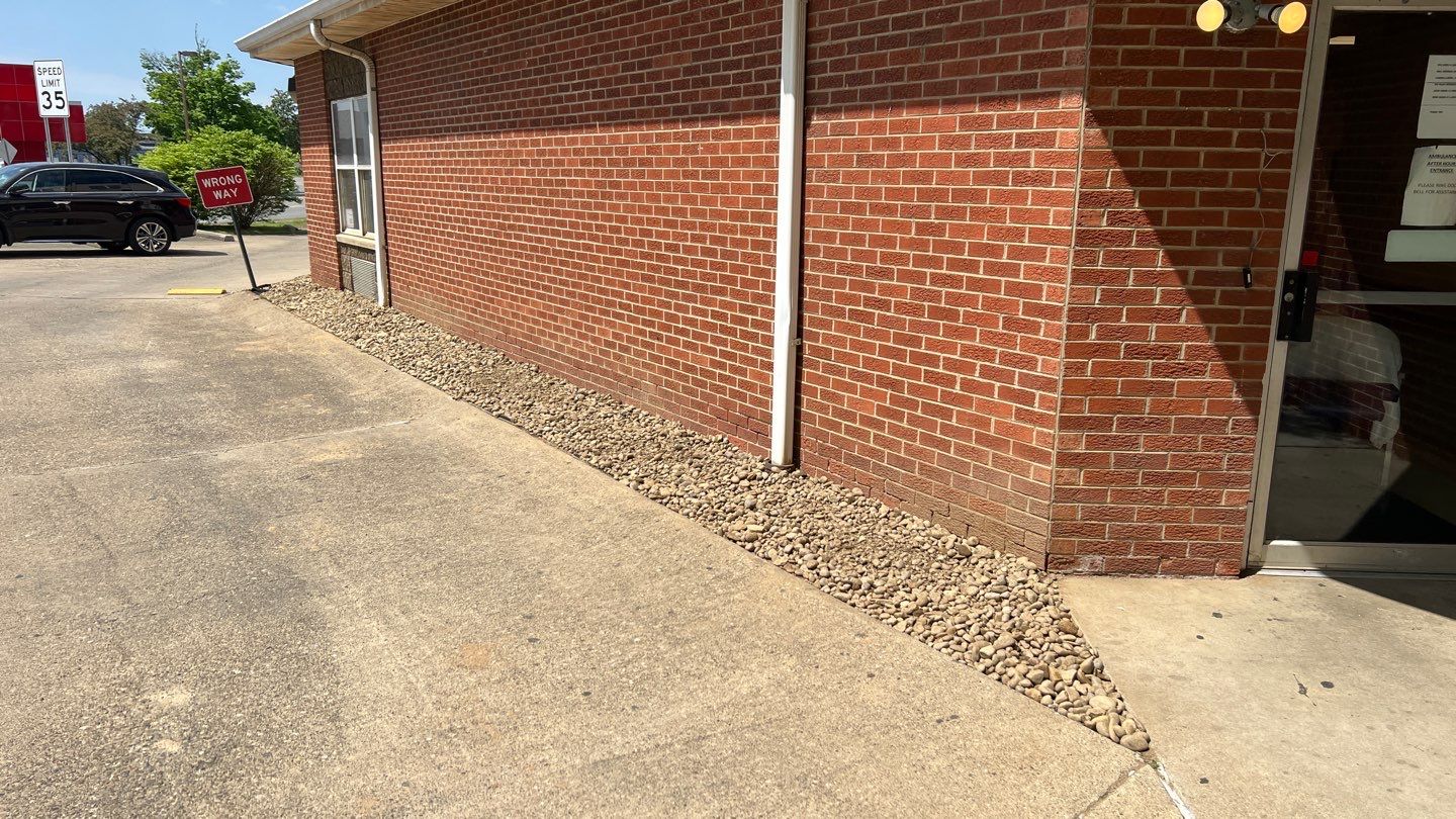 River rock installation using River Rock by GrassBusters, Inc.