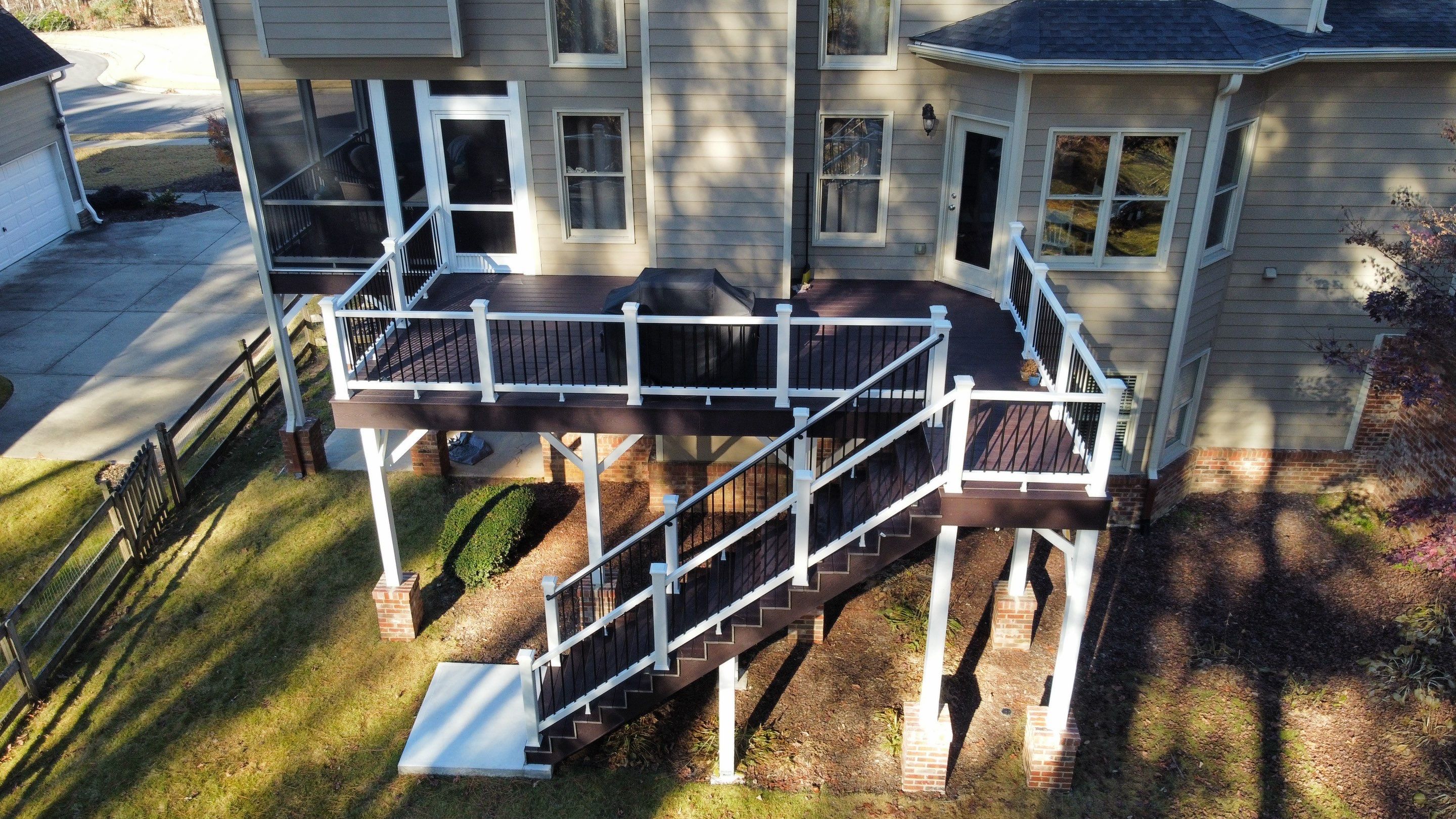 Multi-Level Composite Deck and Screened Porch in Acworth by Swift Home Renovations