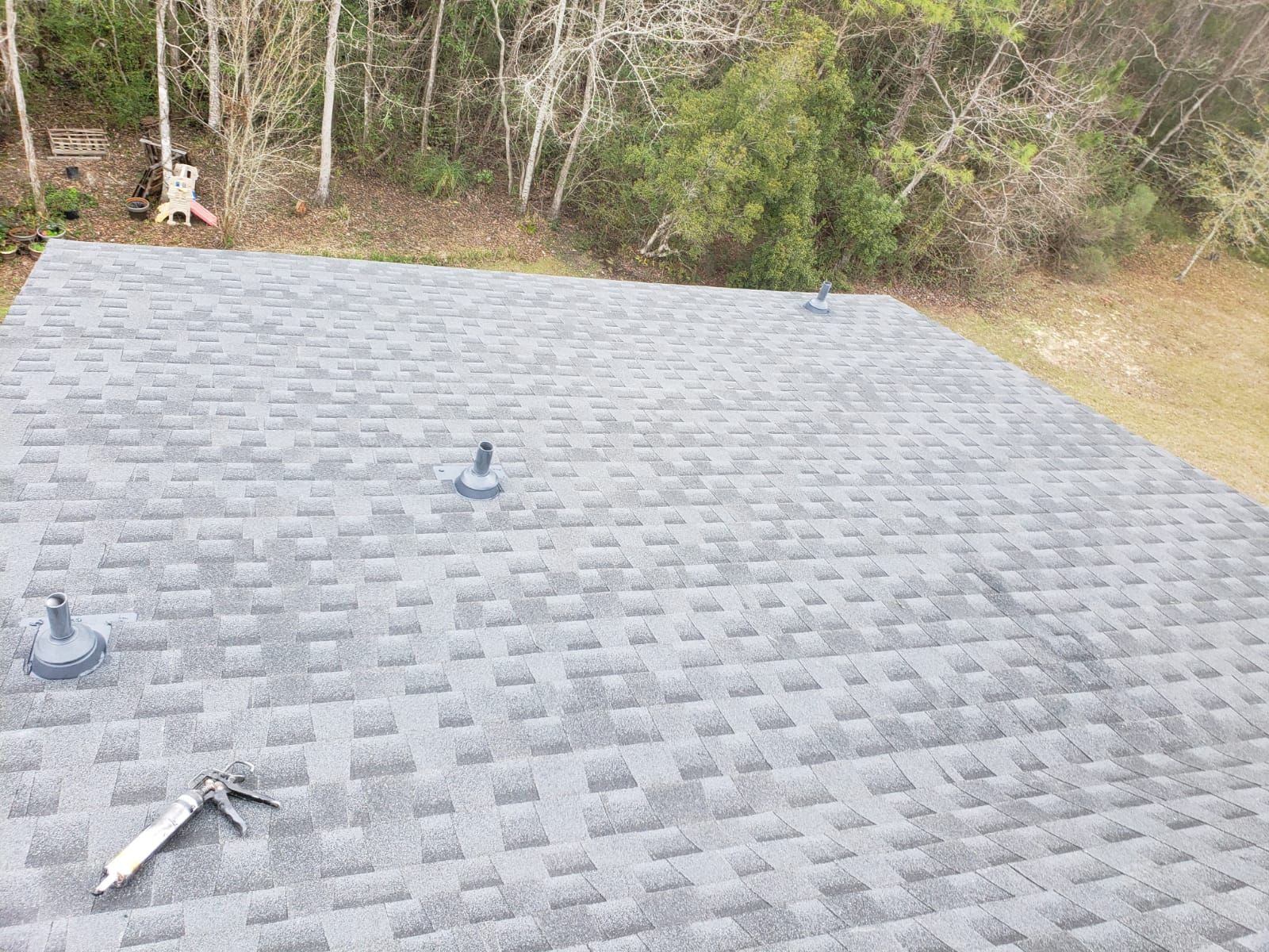 Residential Roofing Installation using Roof Replacement by American Roofing & Construction LLC