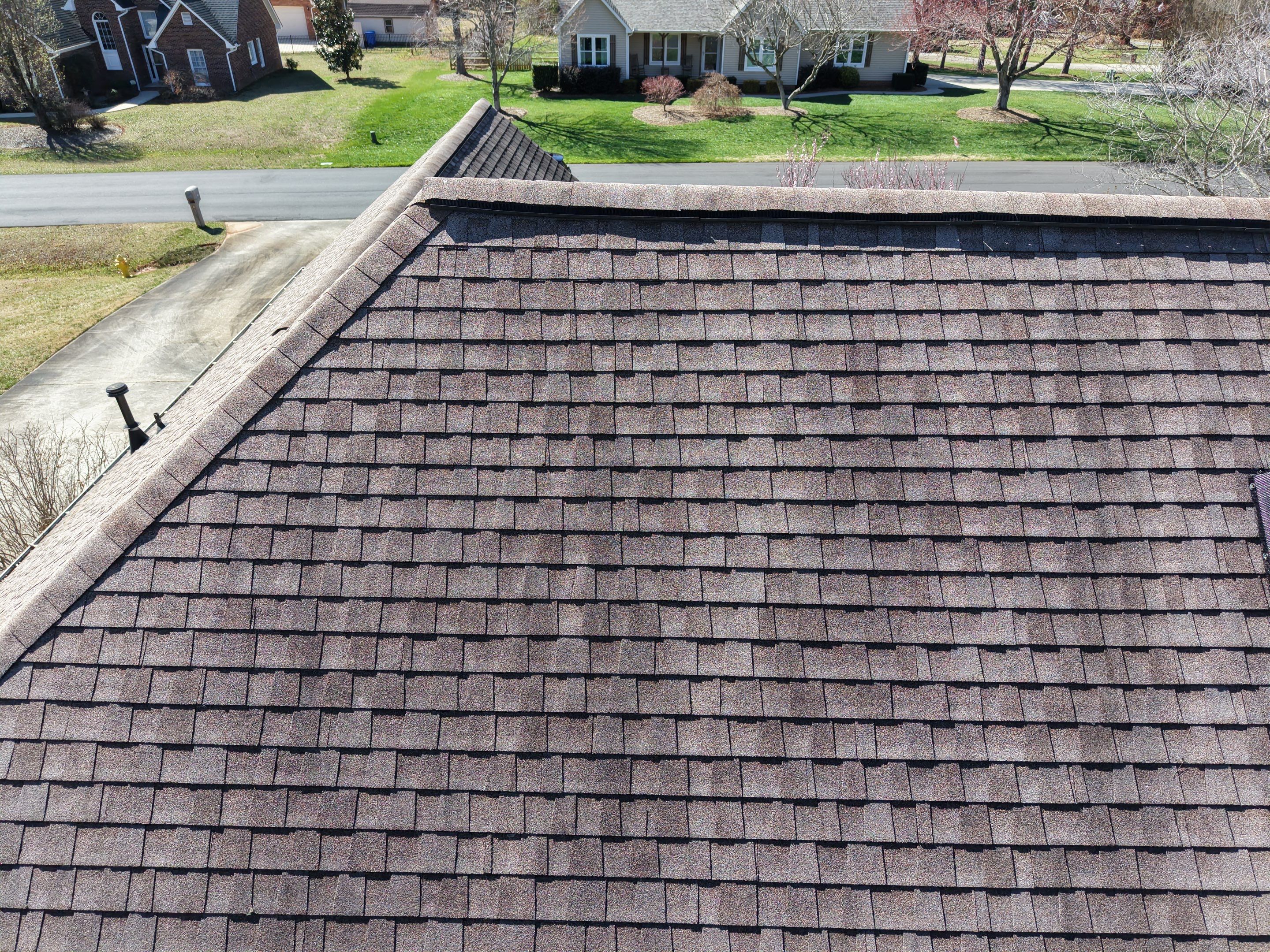 Residential Roofing Installation using TAMKO TITAN XT Rustic Black by RISE Roofing & Restoration, LLC