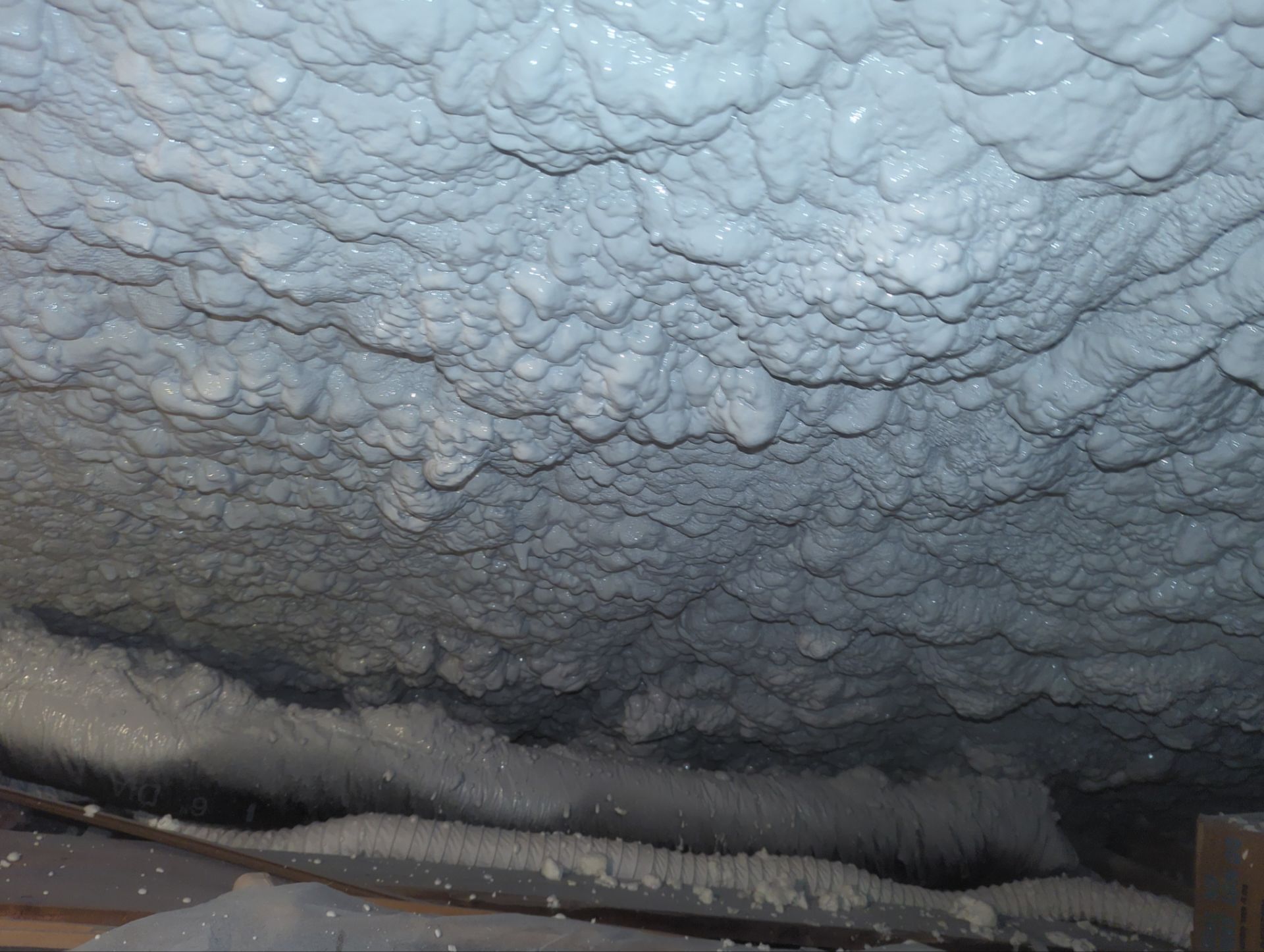 Attic Retrofit using open cell spray foam by NYS Foam & Energy