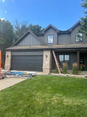 Marvin Window Replacement and Rich Espresso Hardie Siding Installation in Omaha