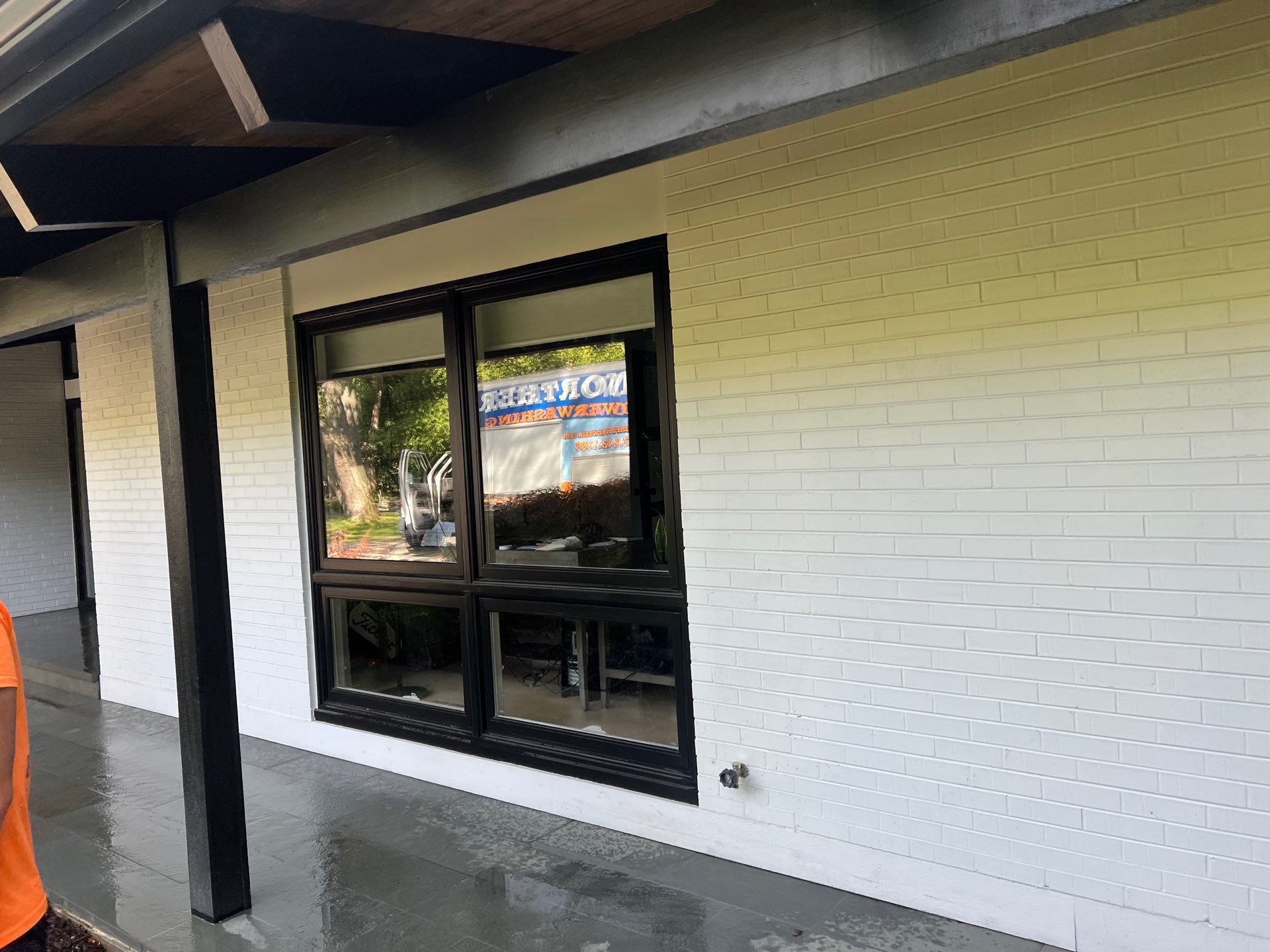 Complete Exterior House, Bluestone & Garage Floor Cleaning by Northern Power Washing LLC.