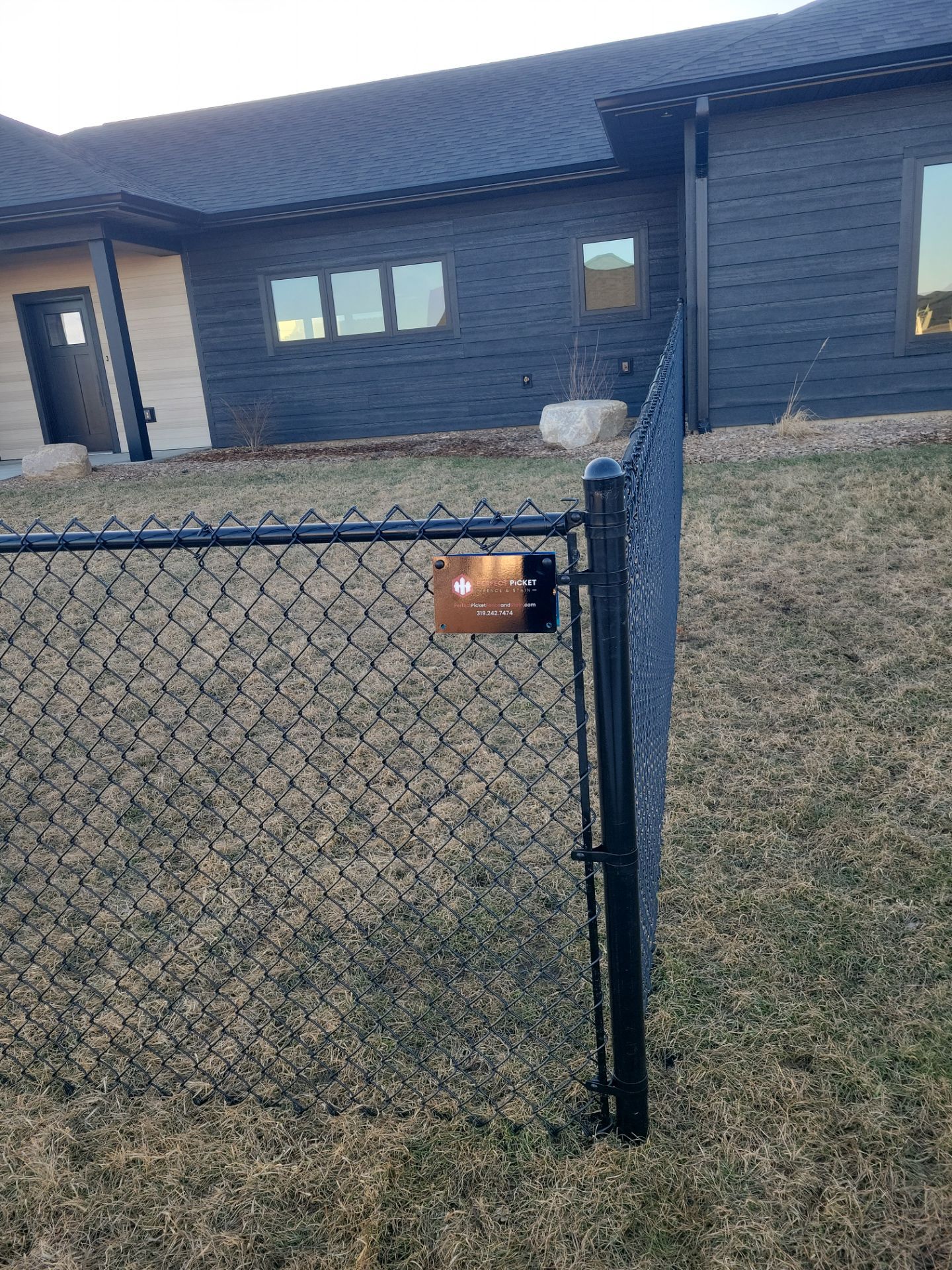 Residential Fencing Installation for New Construction Homes in Cedar Falls by Perfect Picket Fence and Stain