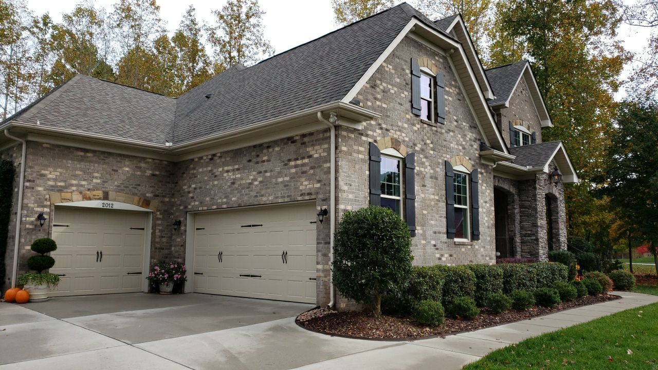 House Wash using cleaner by Power Wash Masters LLC