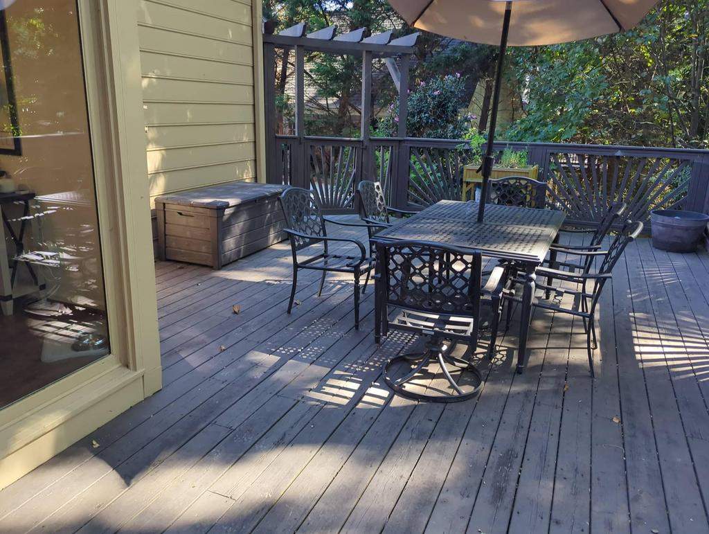 Deckorators Voyage Deck and Shed Style Covered Porch Build with Drink Rail by Nelson Exteriors 