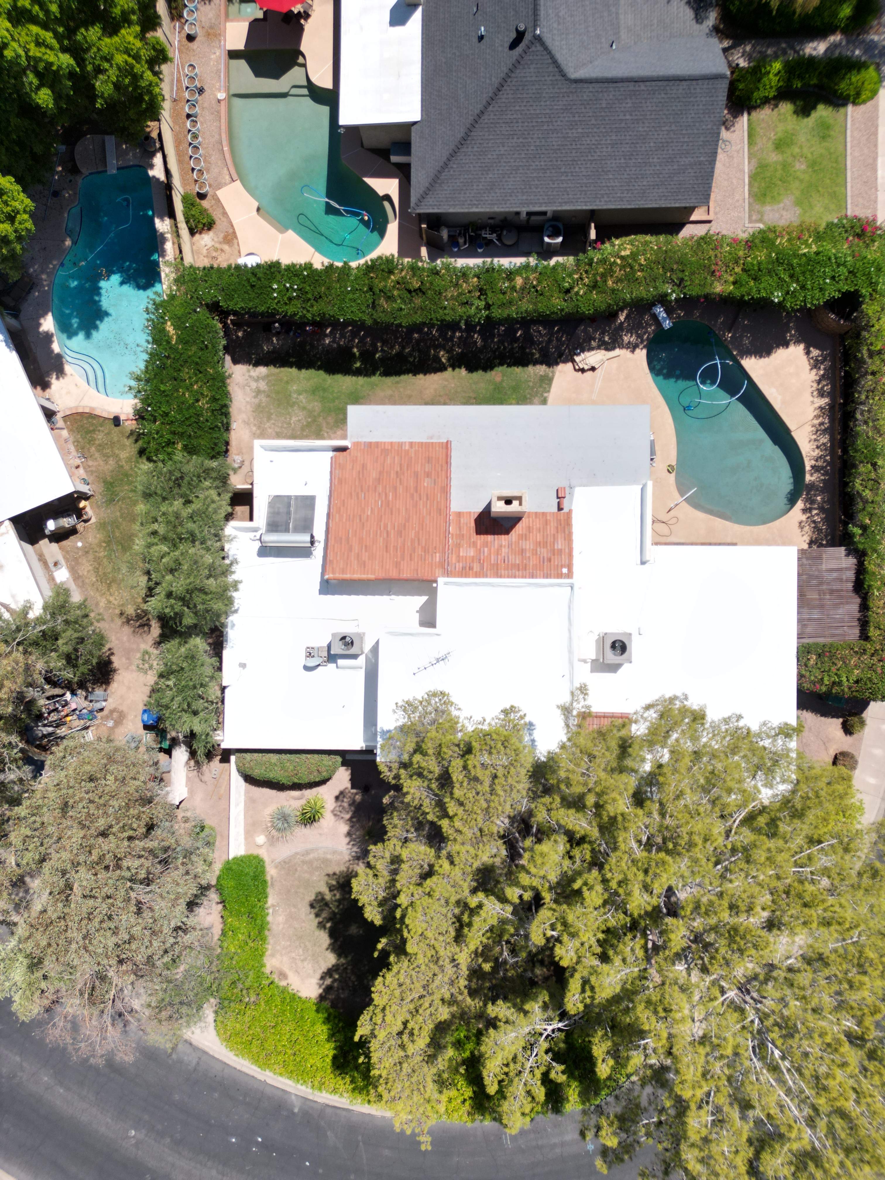 Re-coat & Tile Job by All Storm Roofing & Construction