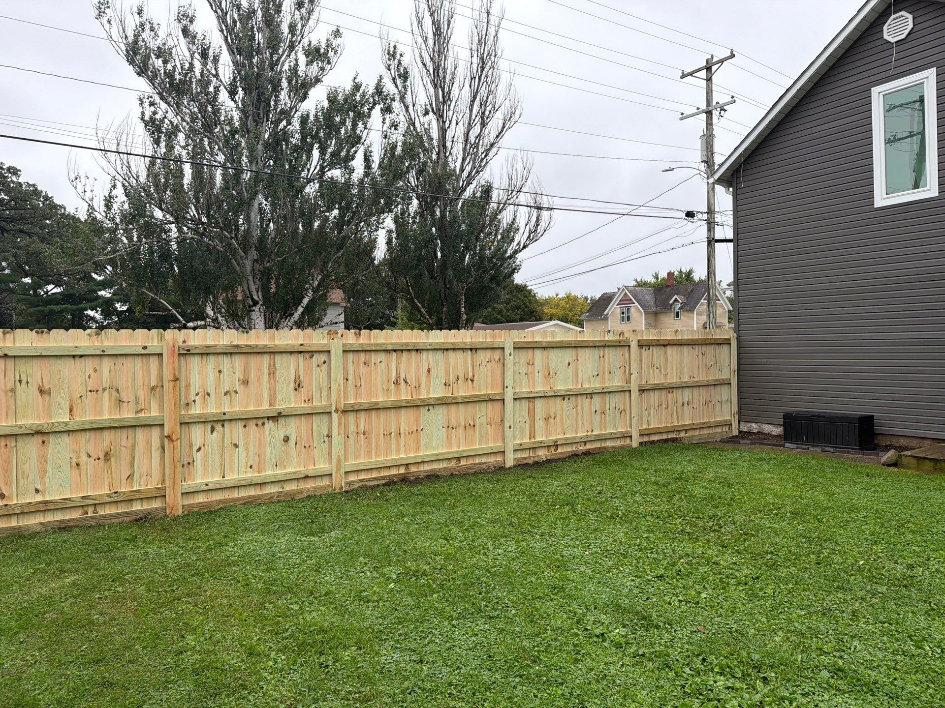Custom Wood Privacy Fence and Black Chain Link Gate in Independence by Perfect Picket Fence and Stain