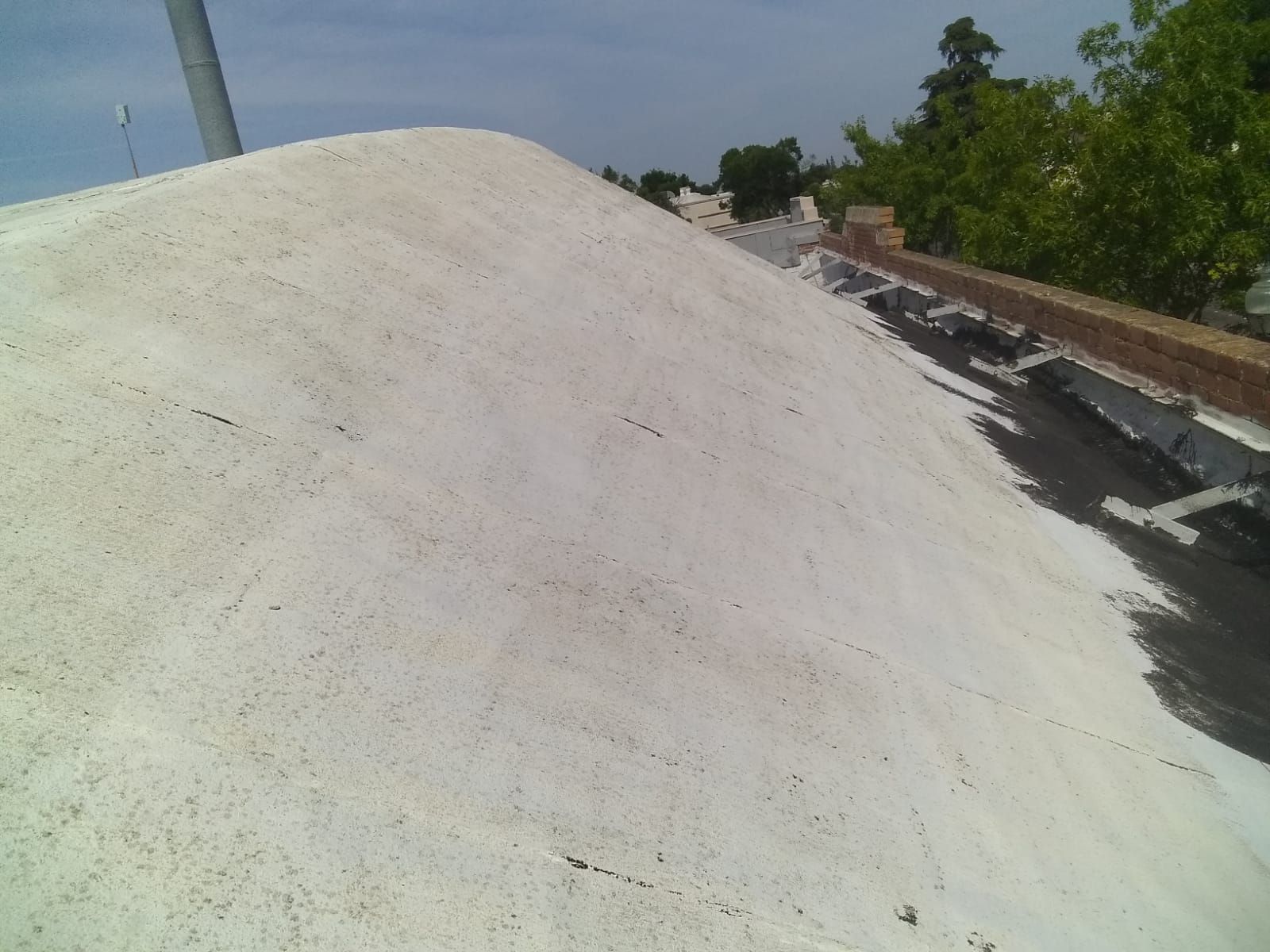 Spray foam and coatings using Conklin Benchmark/PUMA XL coatings and spray foam by Straight Edge Roofing Inc