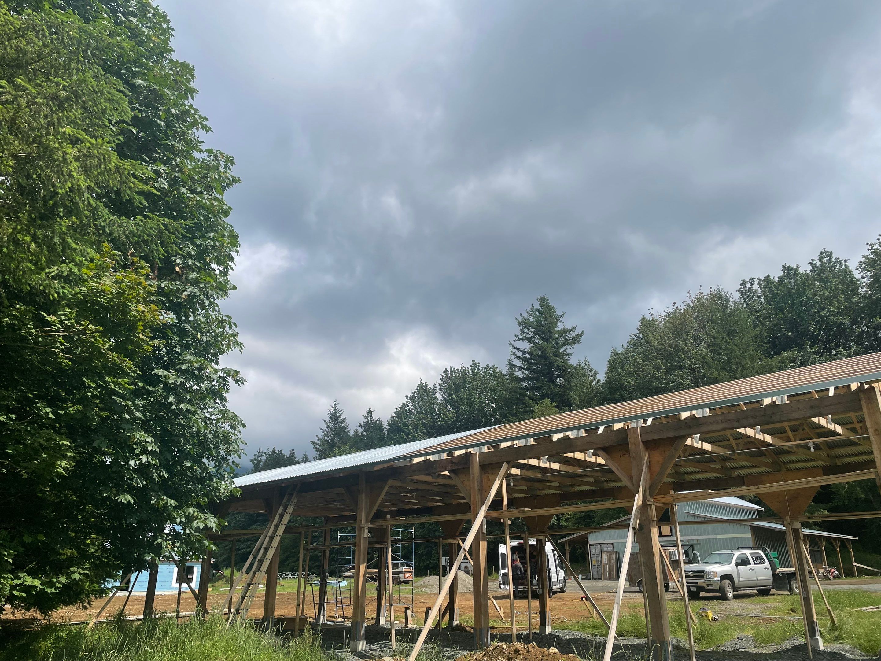 Commercial Roofing Installation using corrugated metal by Top Notch Roofing Inc