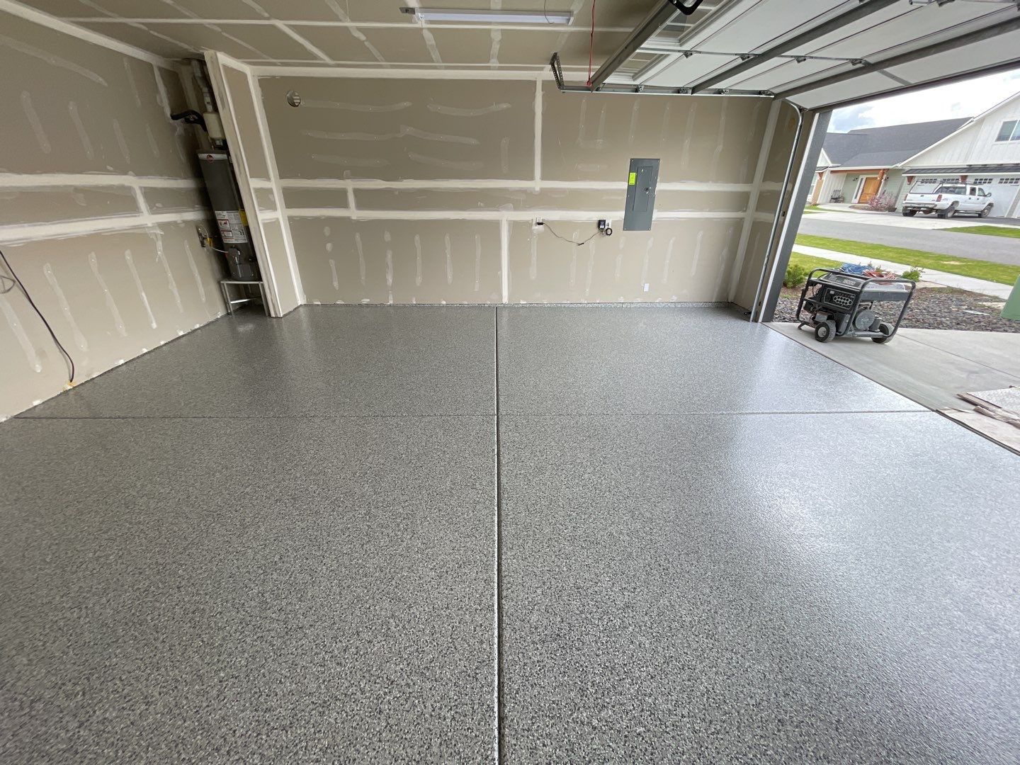 Garage Transformation using Slate Stone by Croc Coatings, LLC