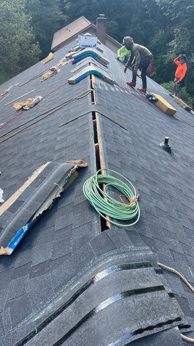 Roof replacement by wind damage by Just Brilliant Restoration JBR