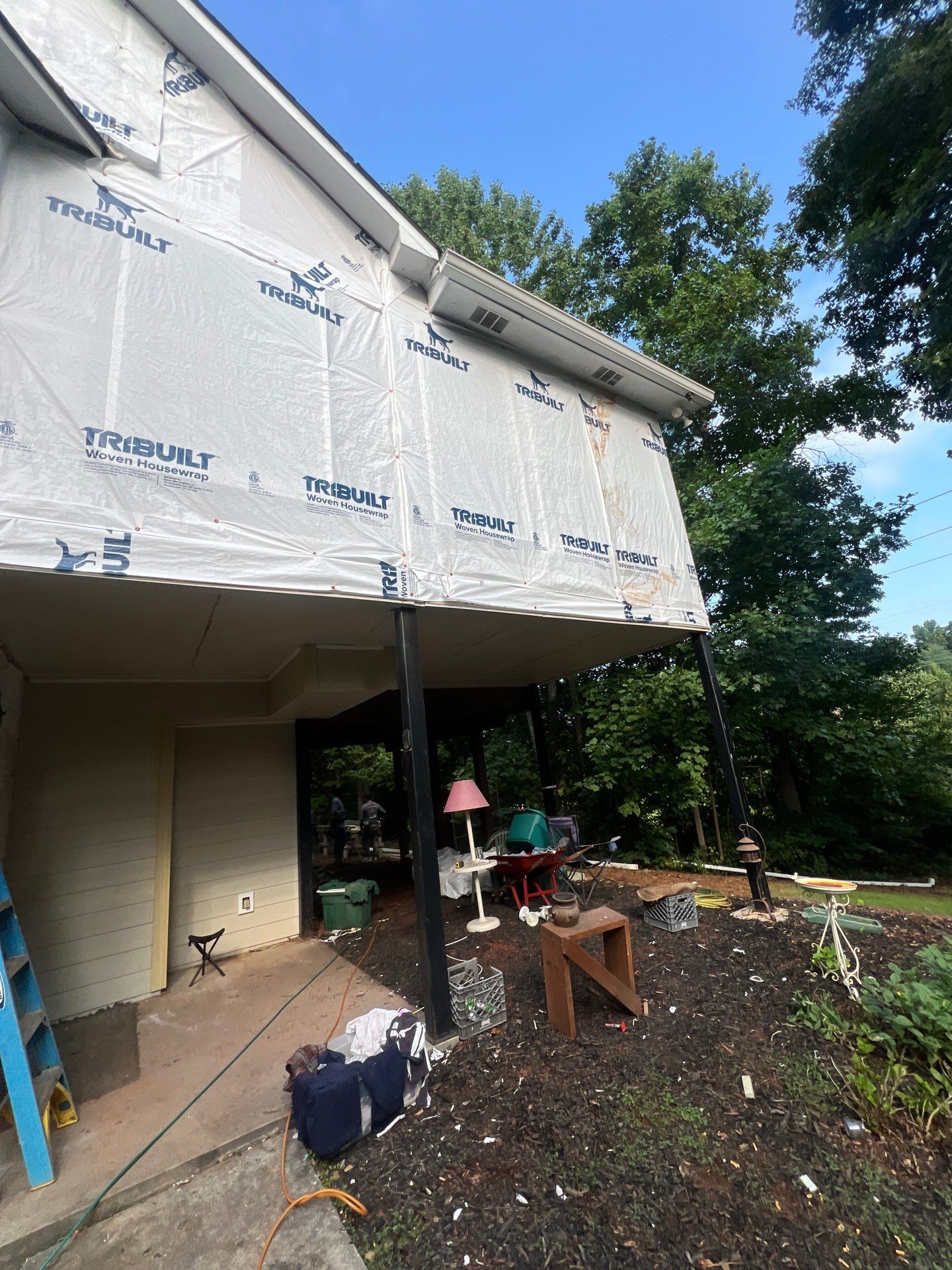 Blue Exterior Paint and Siding Installation using James Hardie Lap Siding by Nelson Exteriors