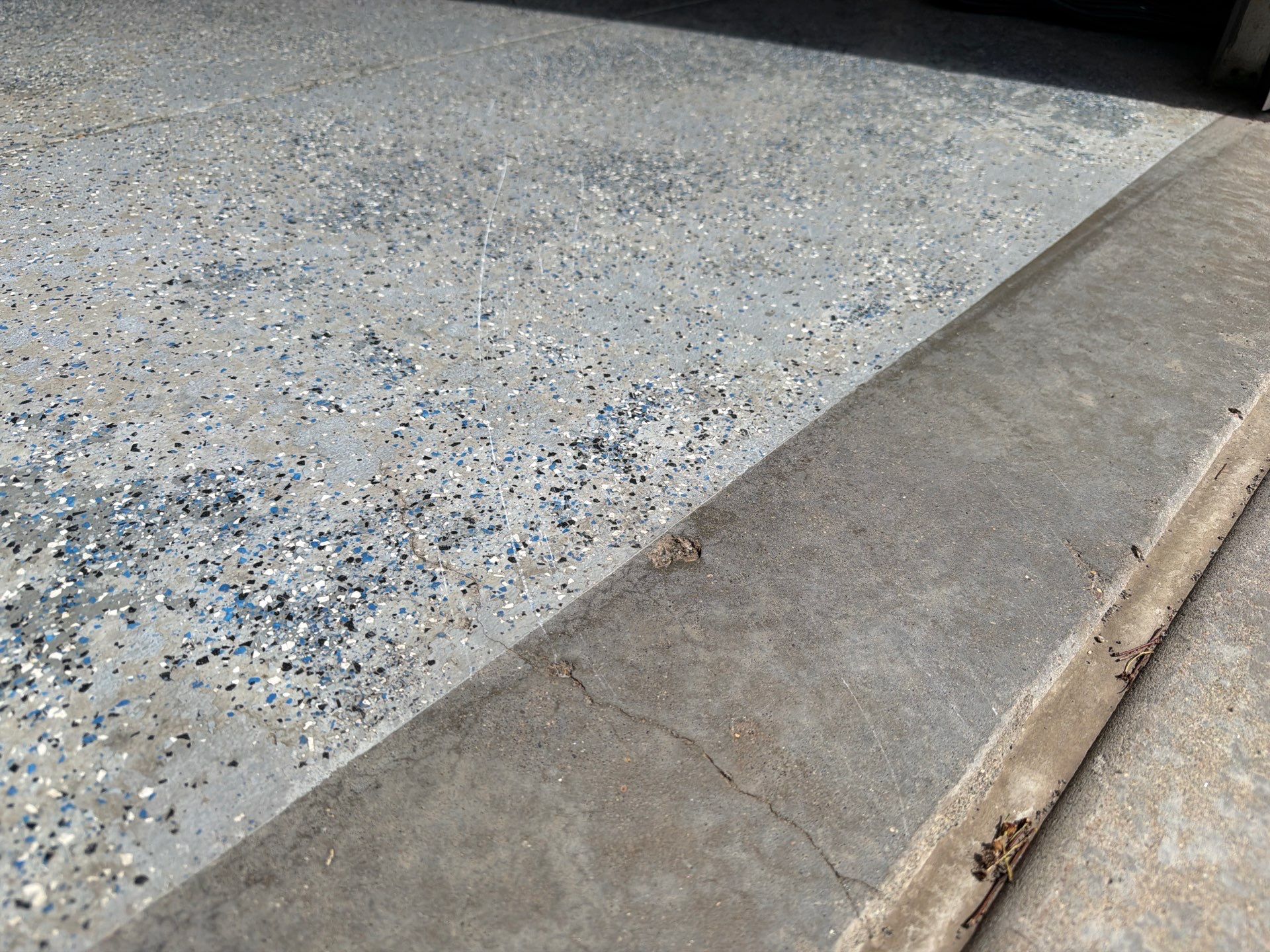Residential Garage Floor Coating in Sioux Falls by Select Painting, Coatings & Garage Cabinets