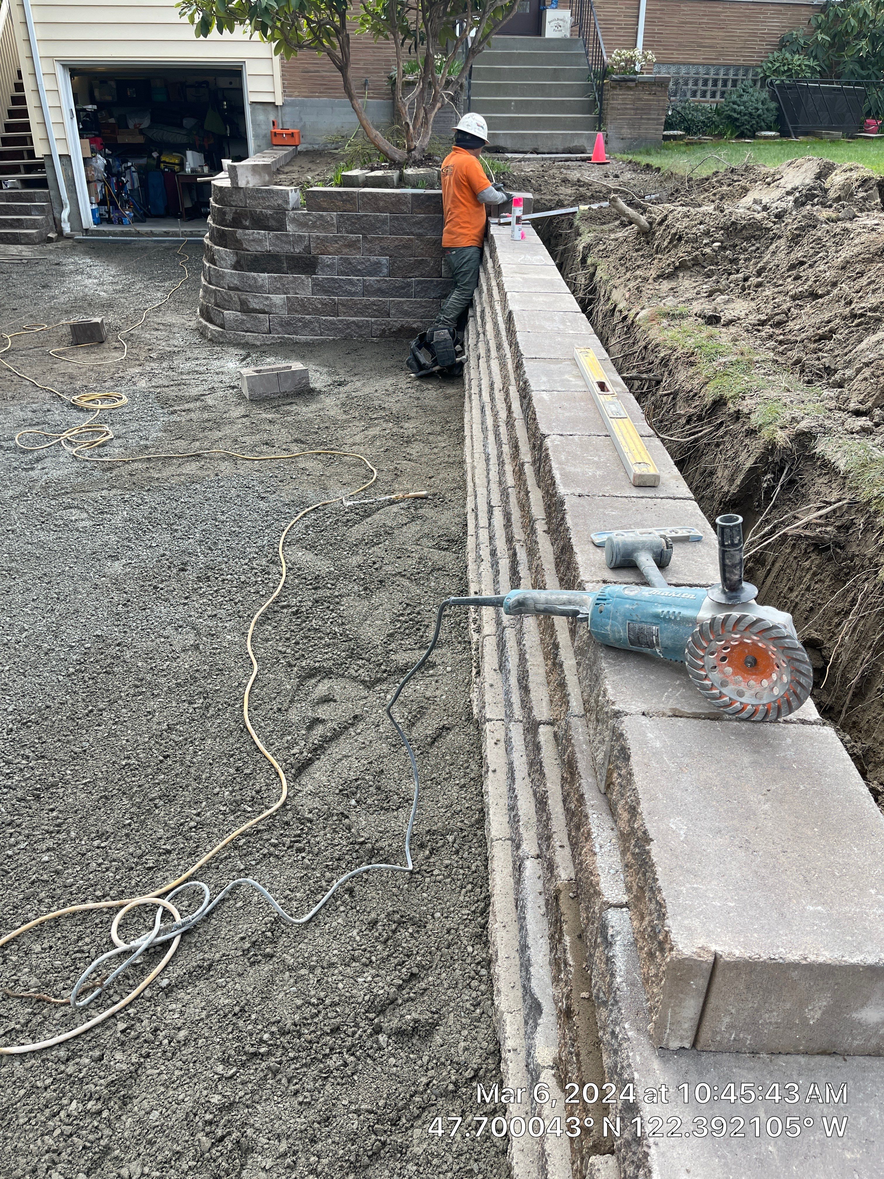 Lorra | Asphalt Driveway Repair & Retaining Wall by Jireh Asphalt & Concrete Inc 