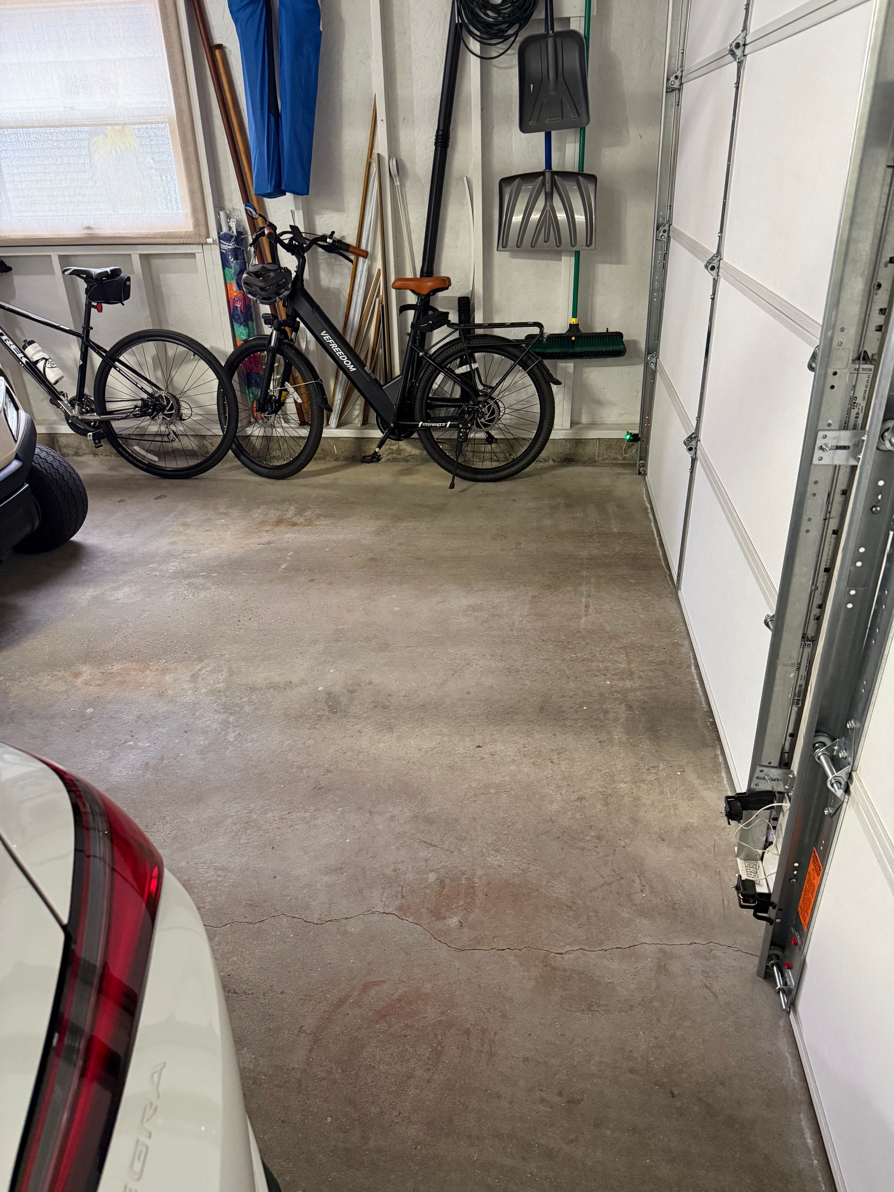 Pentwater Garage Epoxy Flake Floor Installation and Exterior Refinement by Gordon Painting