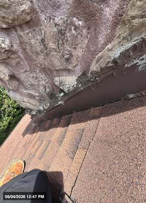 Structural Stone Chimney Restoration and Roof Repair in Leavenworth