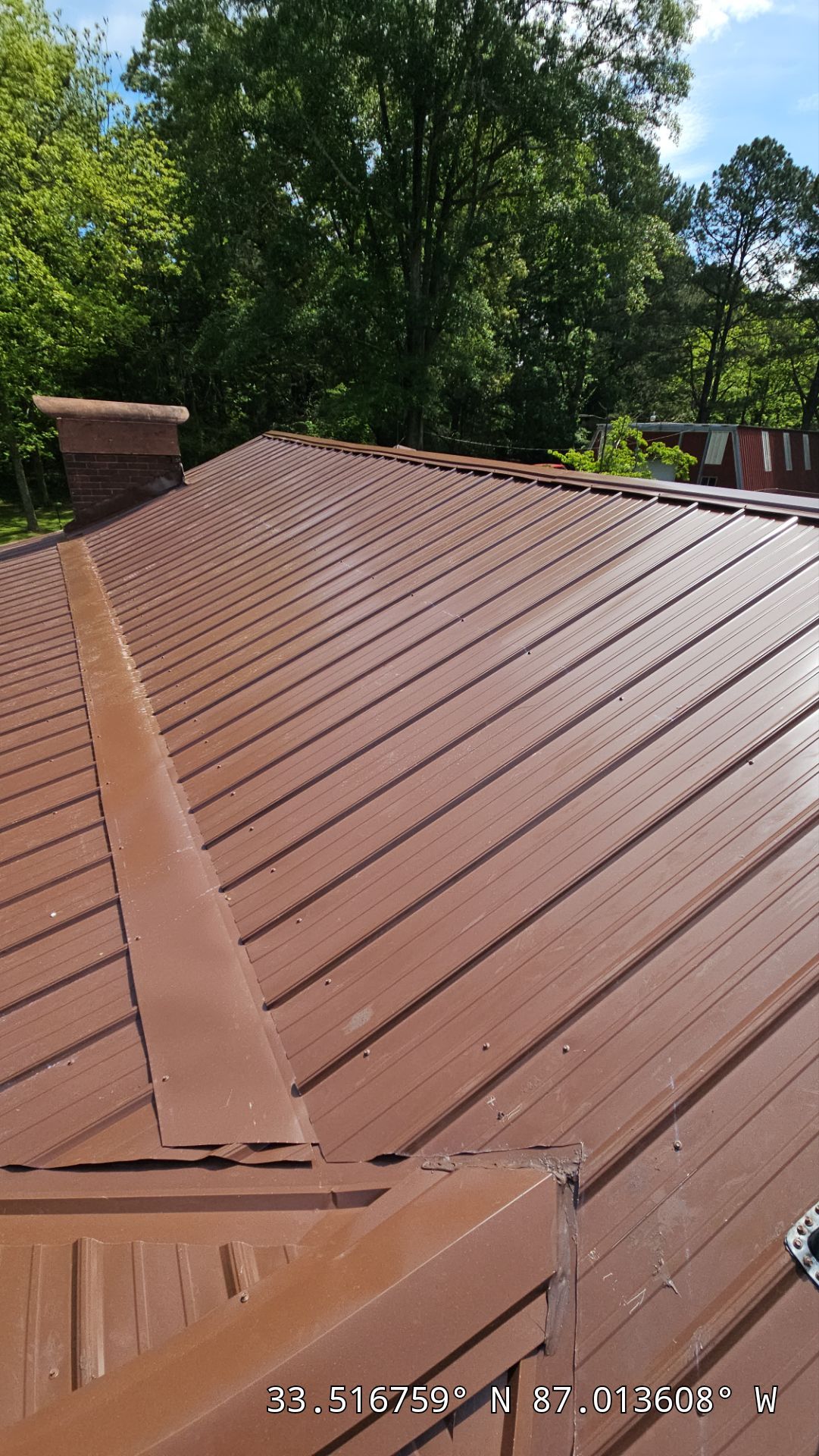 Metal Roof Replacement in Sylvan Springs (Brown) by The Roofing Dudes