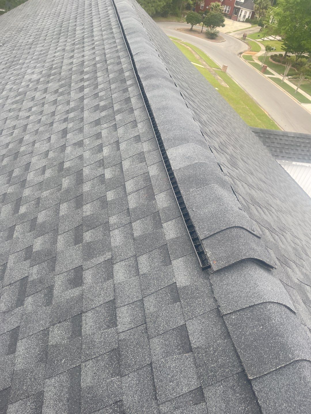 Residential Roofing Installation using Roof Replacement by American Roofing & Construction LLC