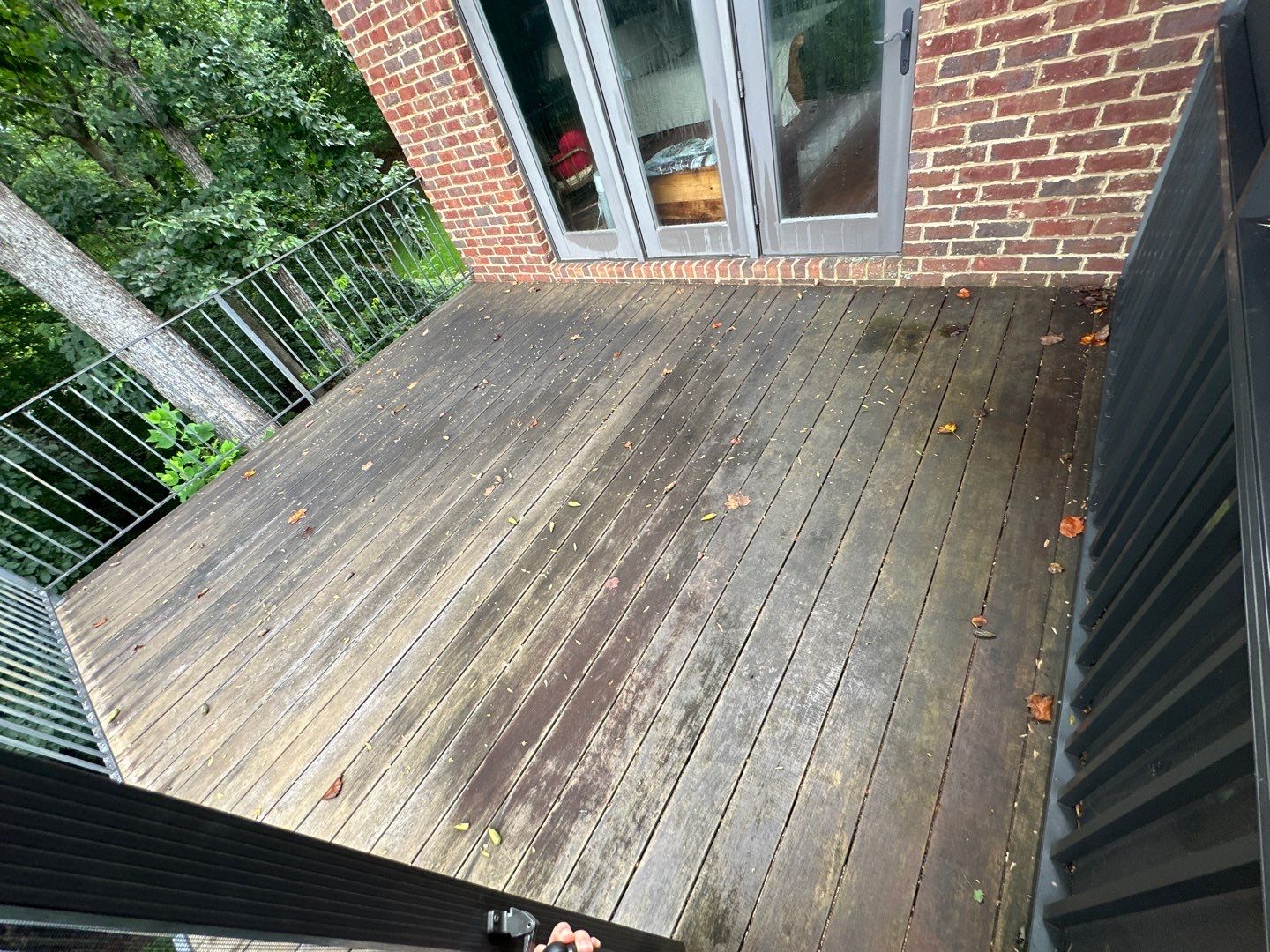 Wood Deck Refinishing and Black Metal Railing Upgrade in Travelers Rest by Painter1