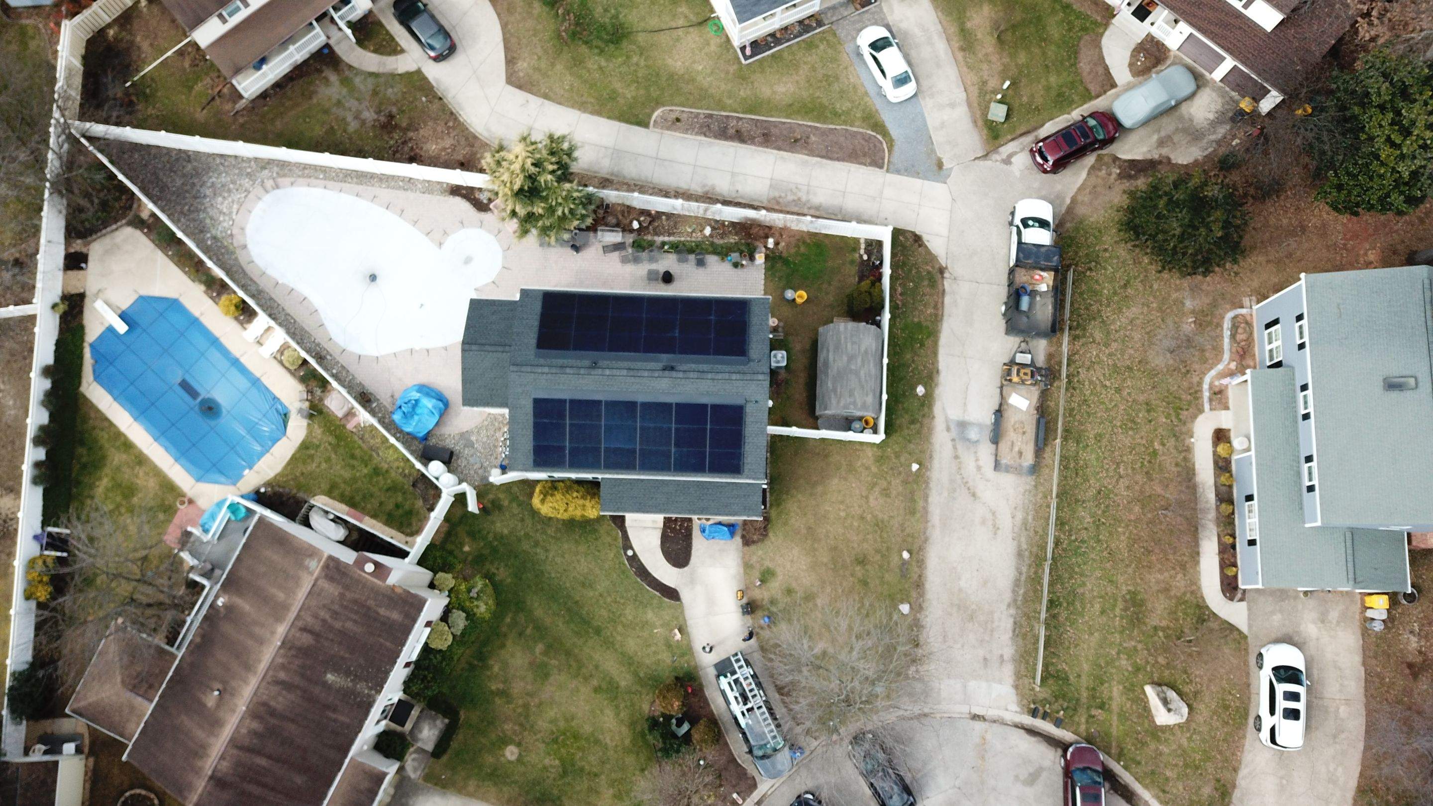 Roof Replacement with GAF Decotech integrated solar panels by American Home Contractors