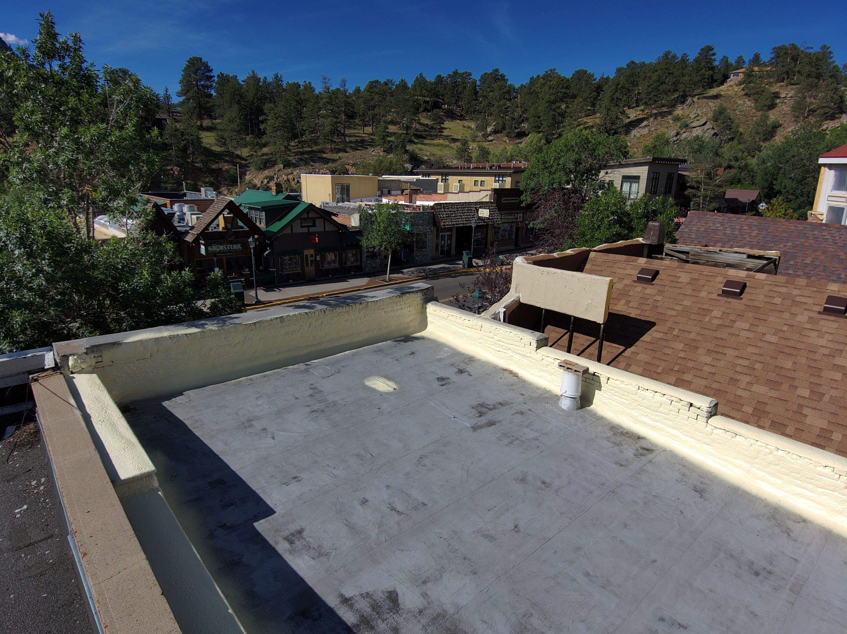 Estes Park "The Taffy Shop" Before & After Gaco Coating by Blue Peaks Roofing LLC