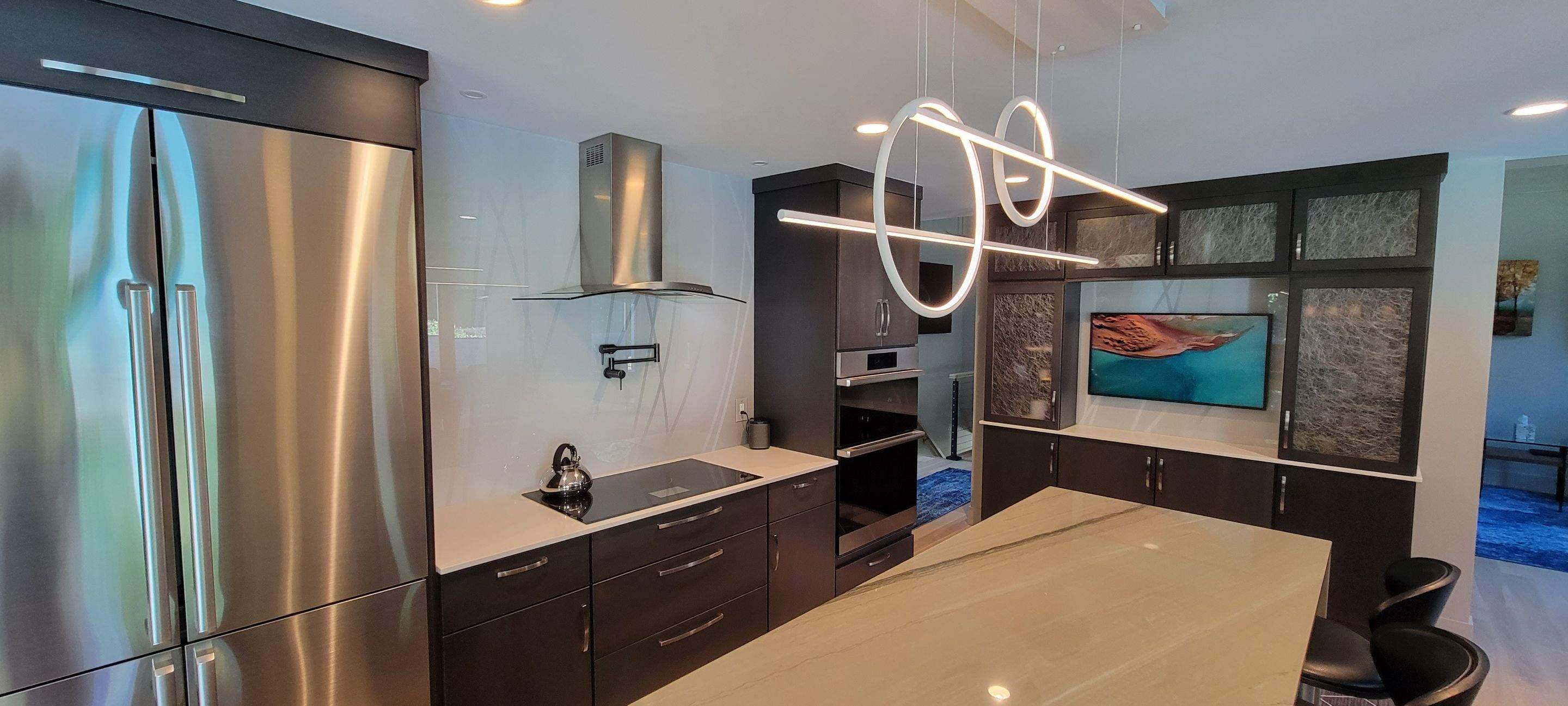 Kitchen Remodel using IMAGIO Misty Curves Solid Glass Backsplash by IMAGIO