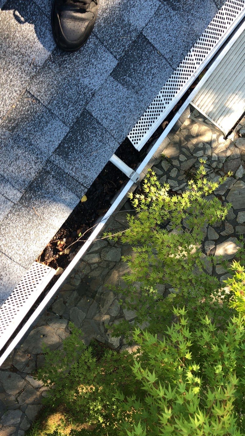 Gutter Cleaning by American Home Contractors