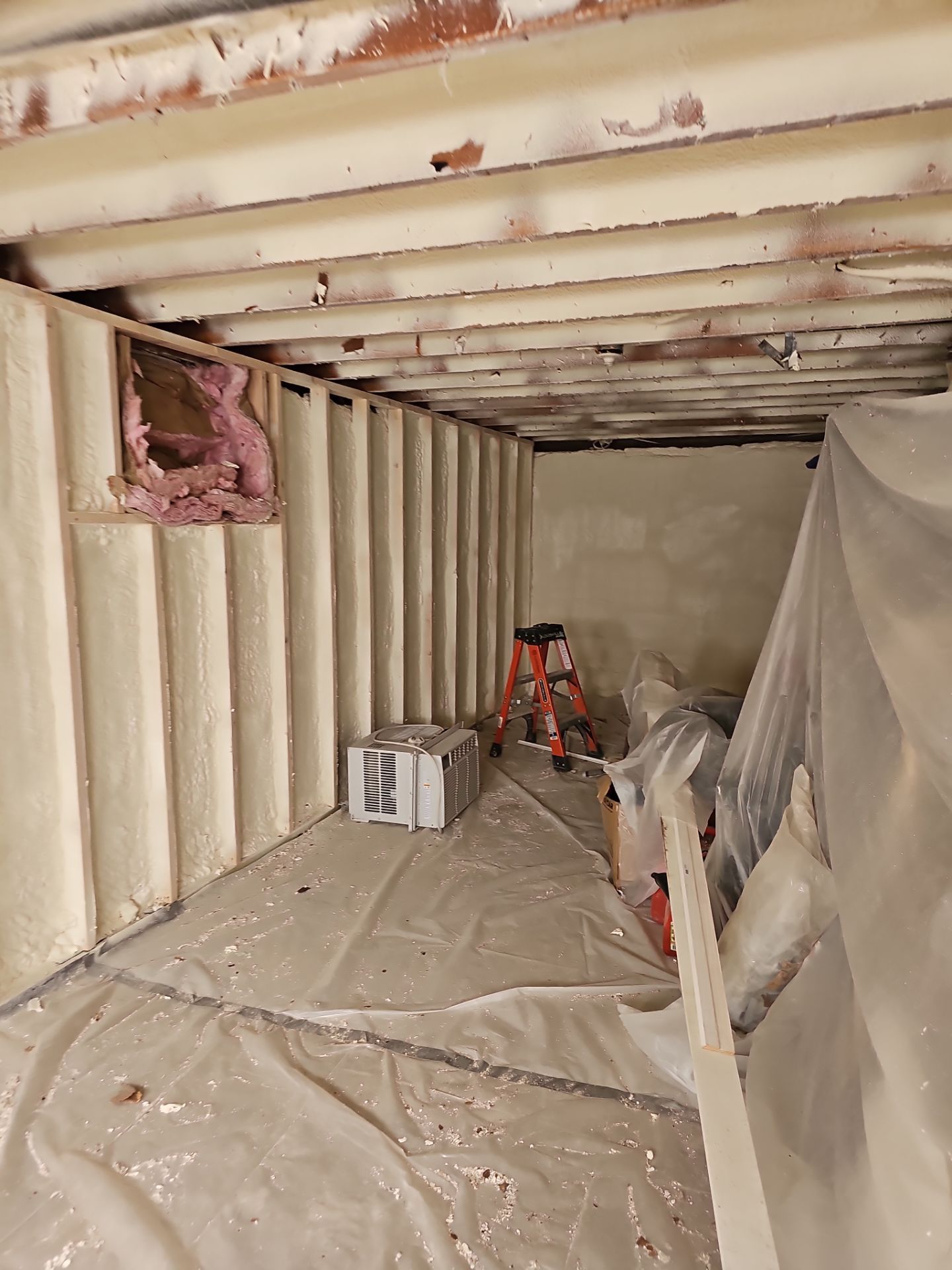 Basement Exterior Walls using Closed Cell Spray Foam by NYS Foam & Energy