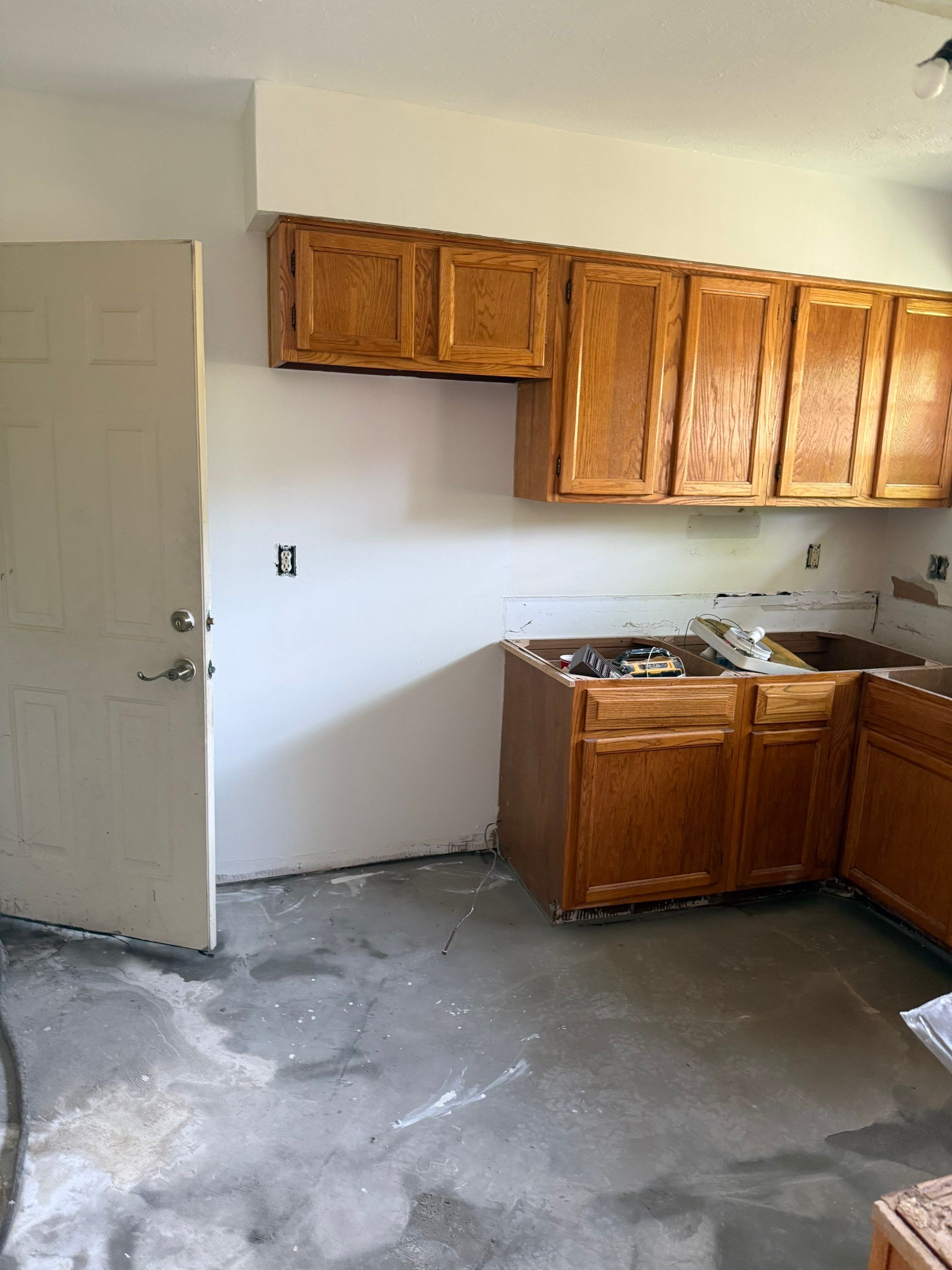 Complete Home Remodel Featuring Custom Kitchen and Wood-Look Plank Flooring by MAJO
