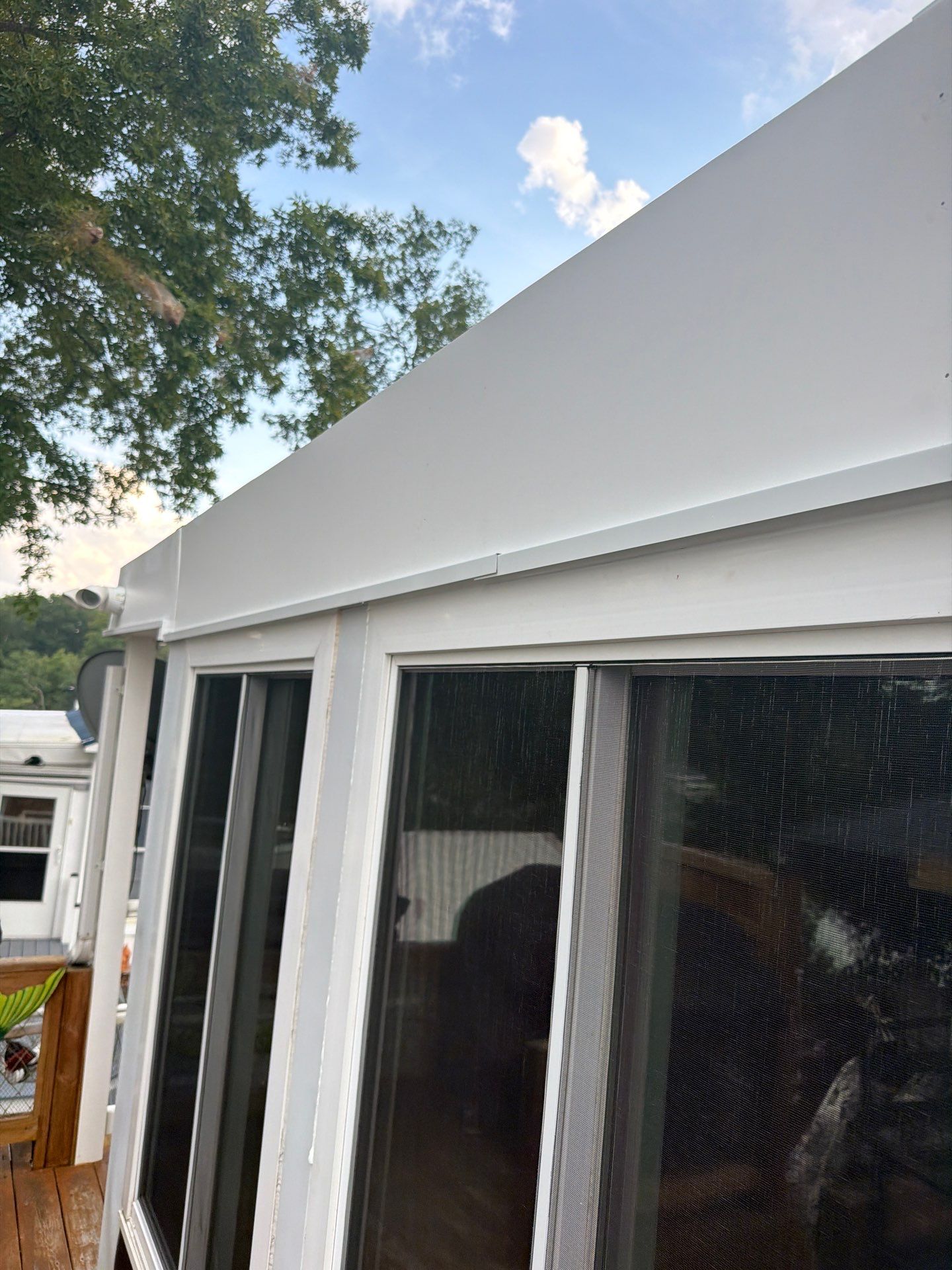 White Standing Seam Metal Roof Installation in Wake, VA by Cade Construction
