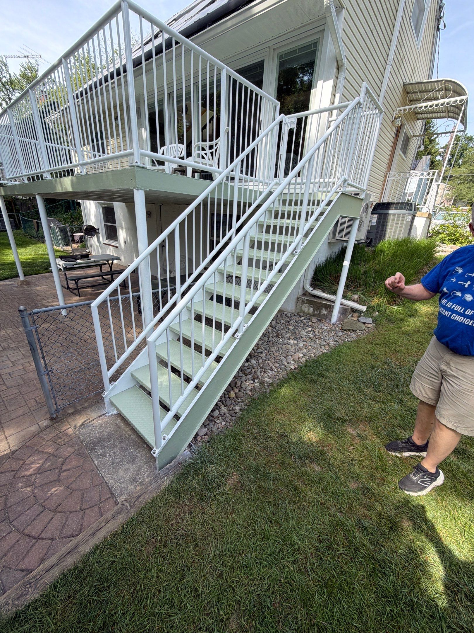 White Powder-Coated Outdoor Railings in Rockville & Staircase and Deck Refurbishment  by Capitol Iron Works