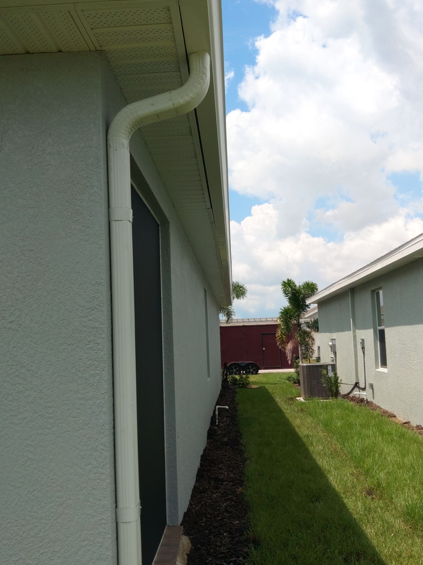White Seamless Gutters for Beachfront Homes  by Gutter Professors