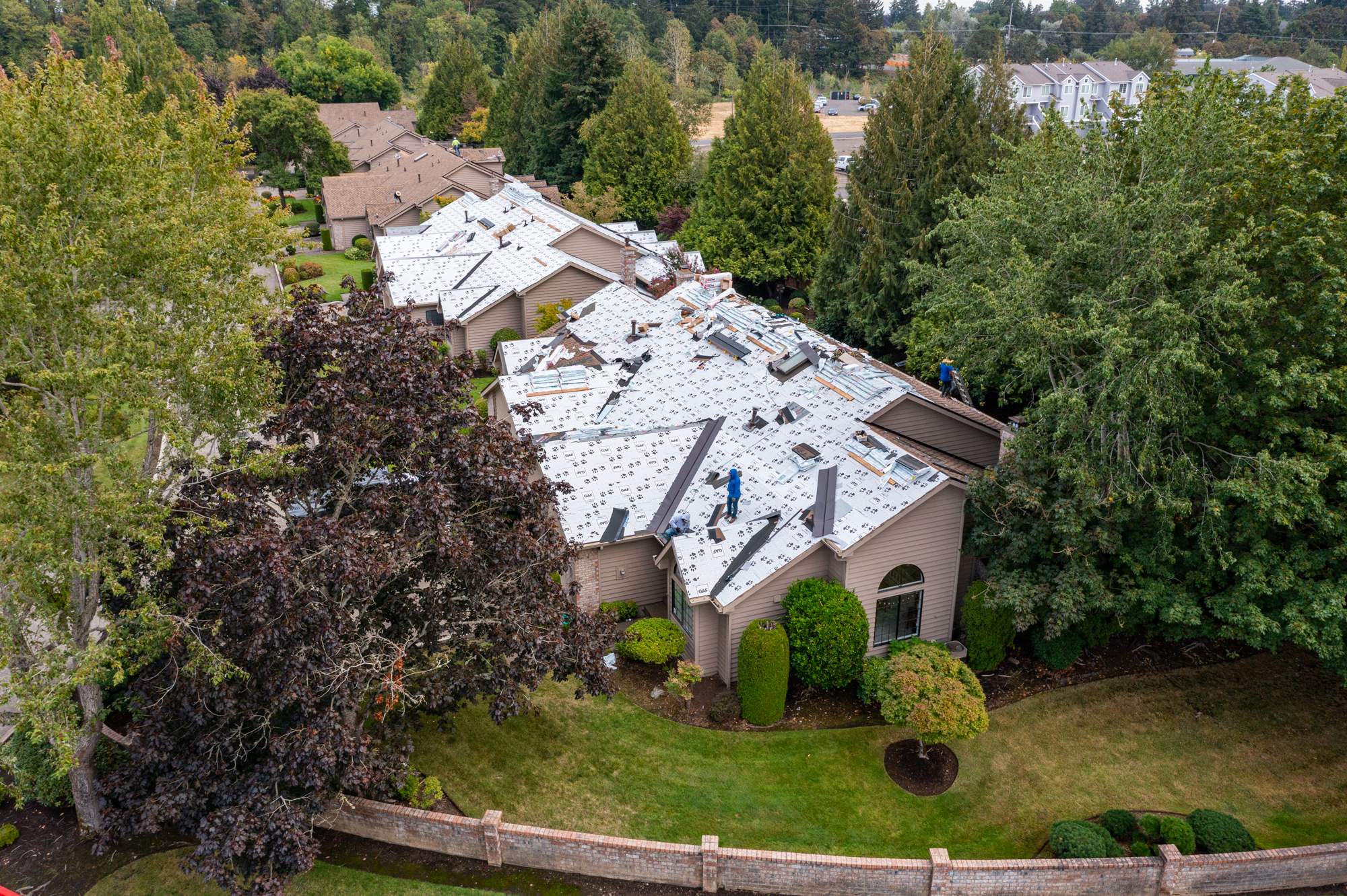 Large HOA Reroof project by Hawthorne General Construction