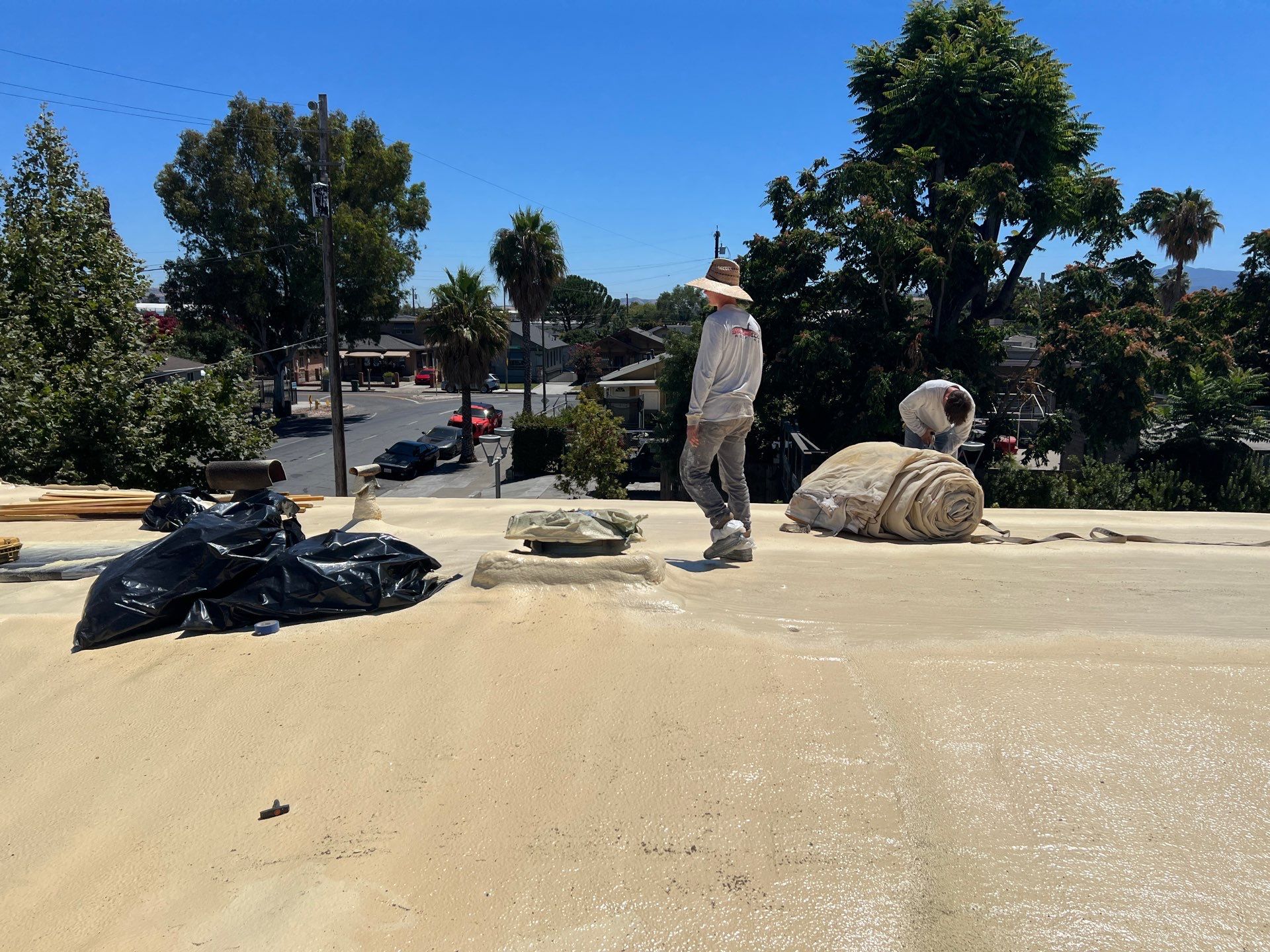Foam Refurbish using Conklin Benchmark/PUMA XL coatings and spray foam by Straight Edge Roofing Inc