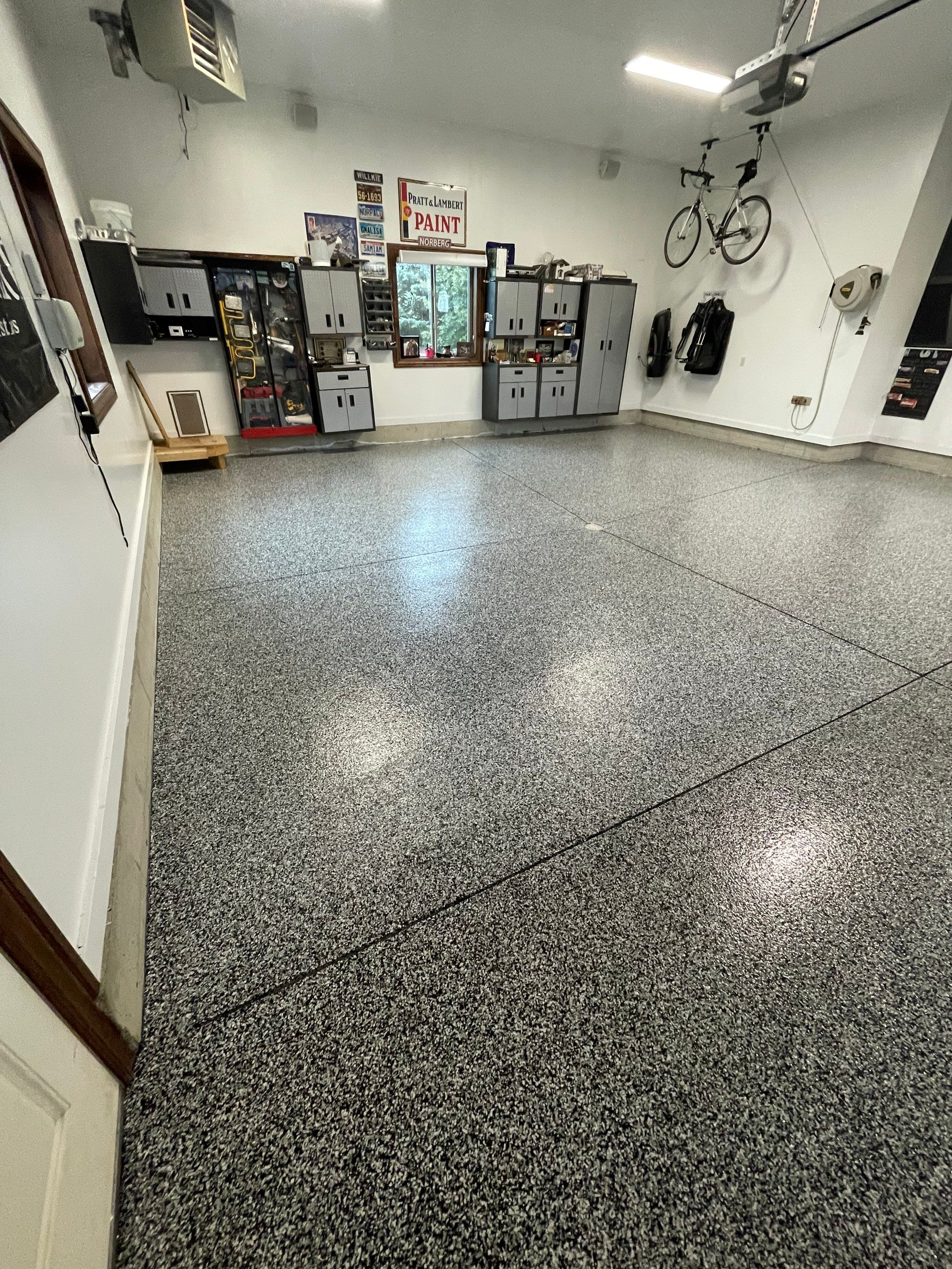 Garage Floor Coating and Domino Flake Finish in Sioux Falls by Select Painting, Coatings & Garage Cabinets