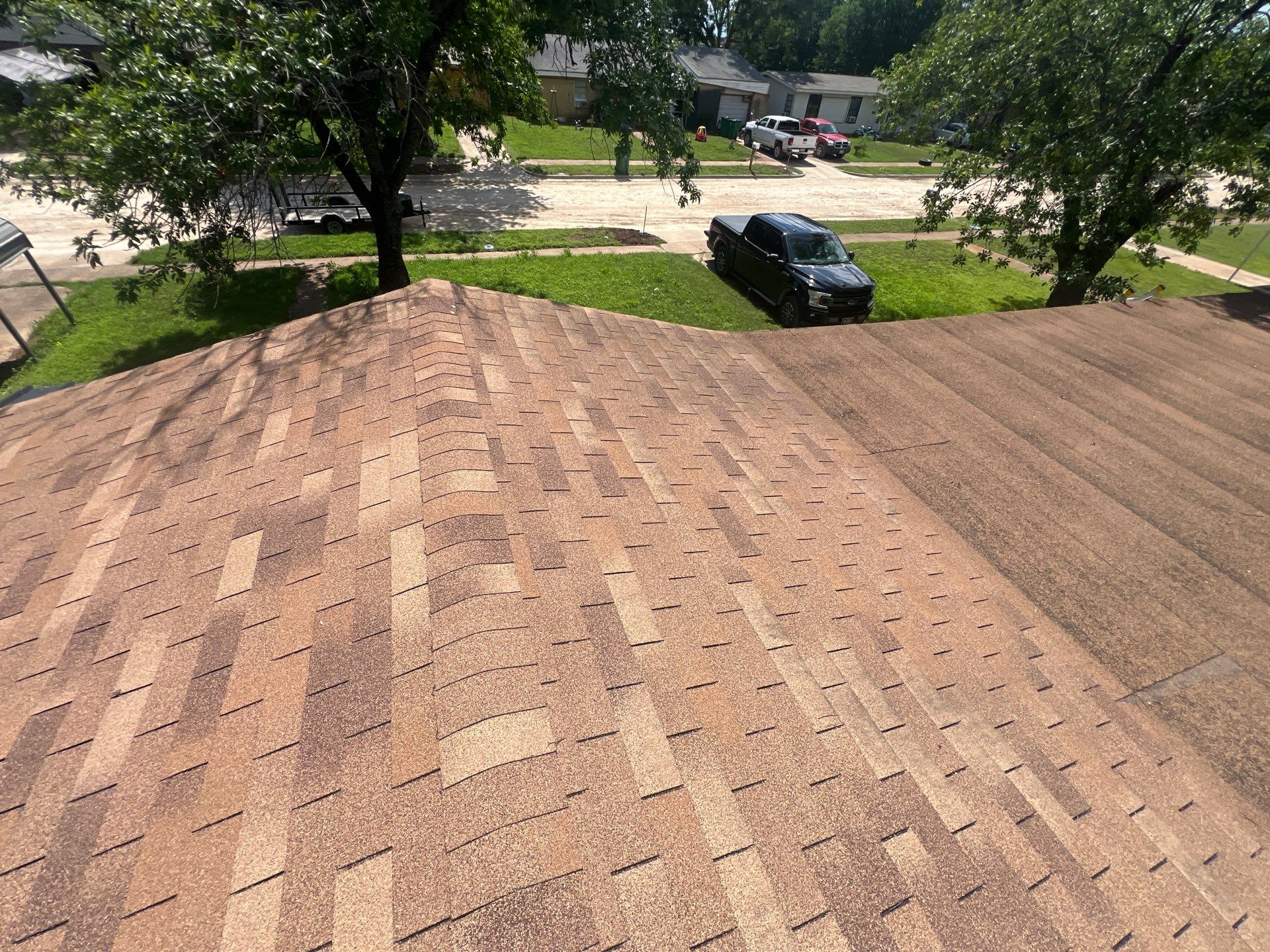 Residential Roofing Installation using IKO Cambridge Dual Black and Mule Hide Rolled Roofing Base and Cap Sheet by WR Roofing Solutions