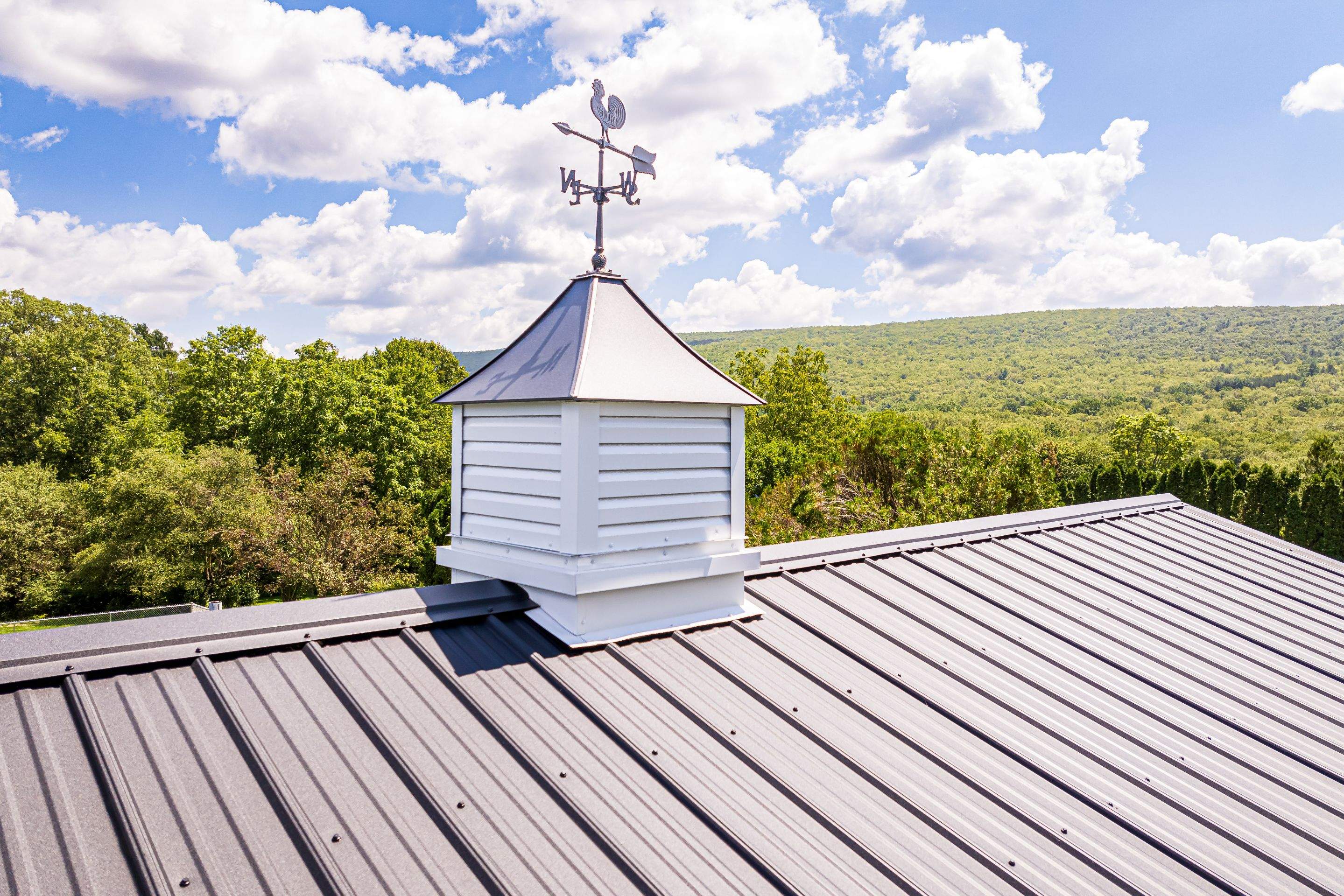 Metal Roof, Soffit and Fascia and siding by Esh Builders
