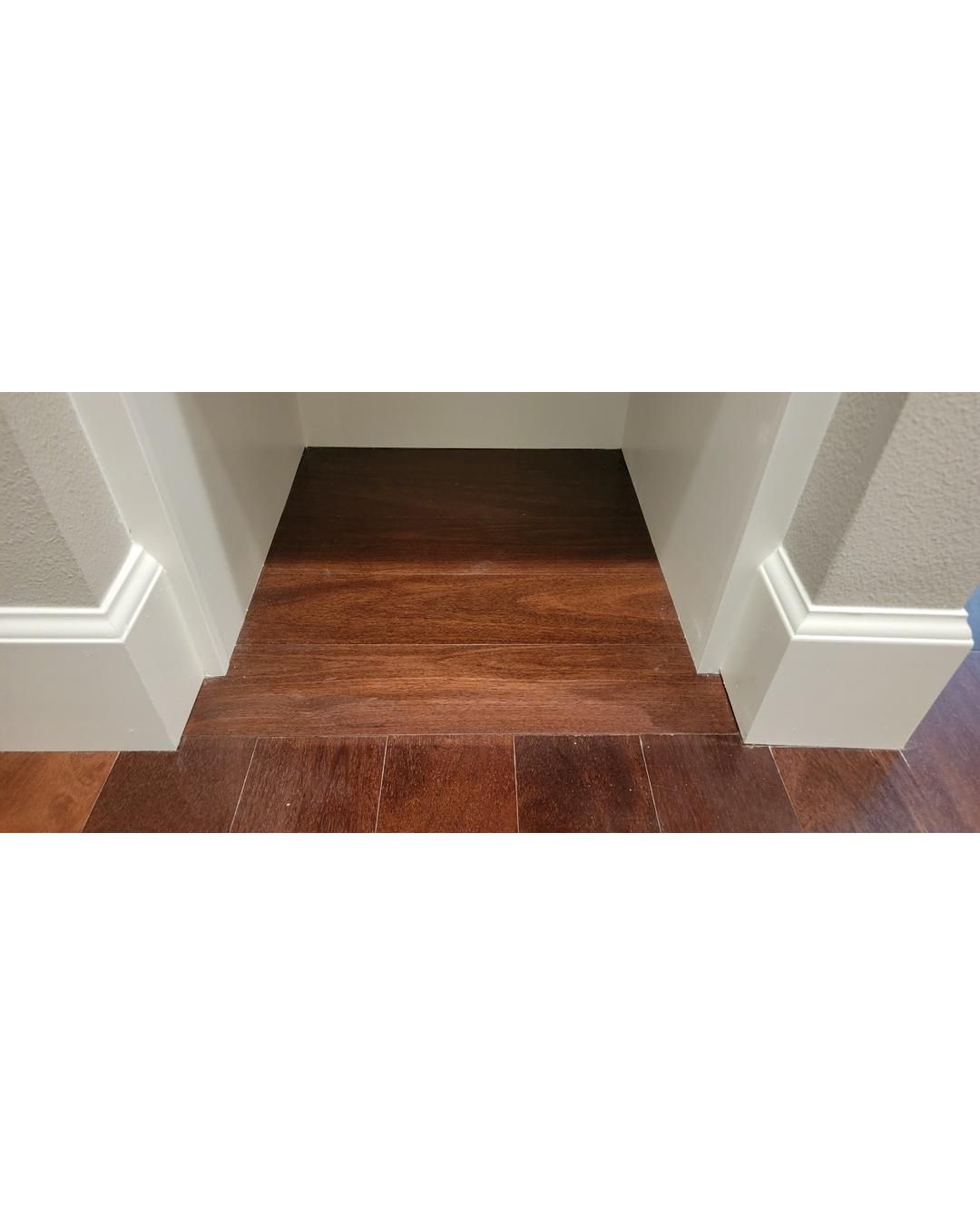 Closet transformation to coffee nook with custom shelves and LED lighting.  by Crm Services Llc