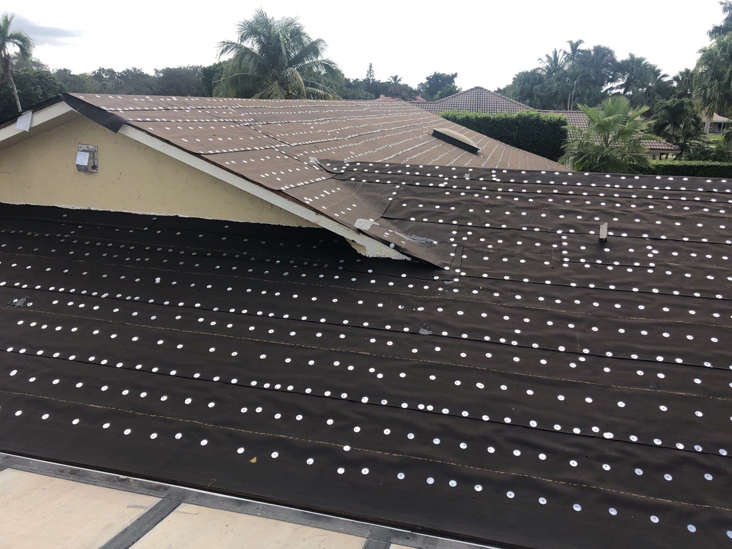Residential Roofing Installation using 1" Nail strip metal roof by BLUES BROTHERS ROOFING