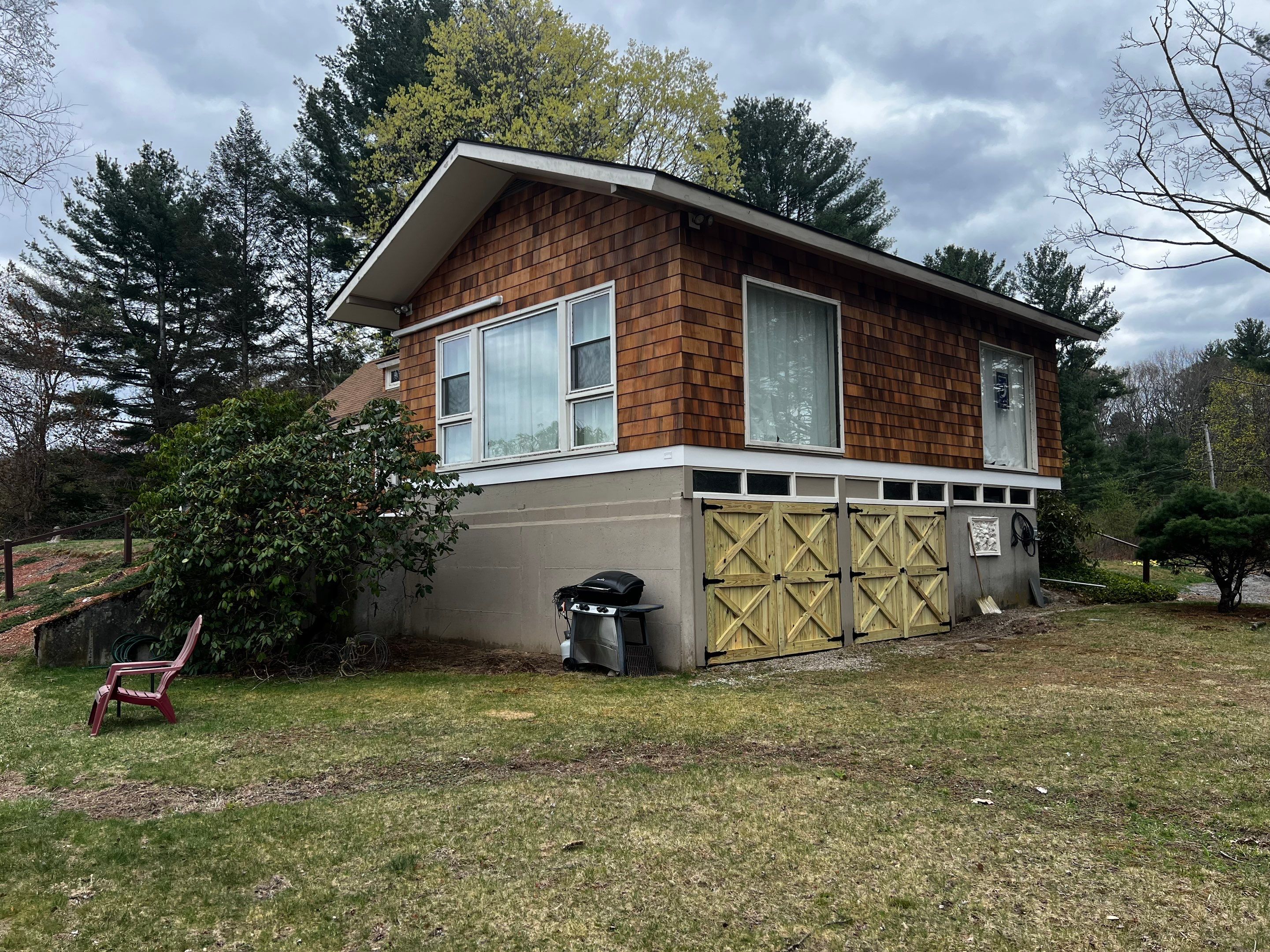 Siding Installation using Perfection Red Western Cedar Shingles  by Loyalty Exterior Solutions 