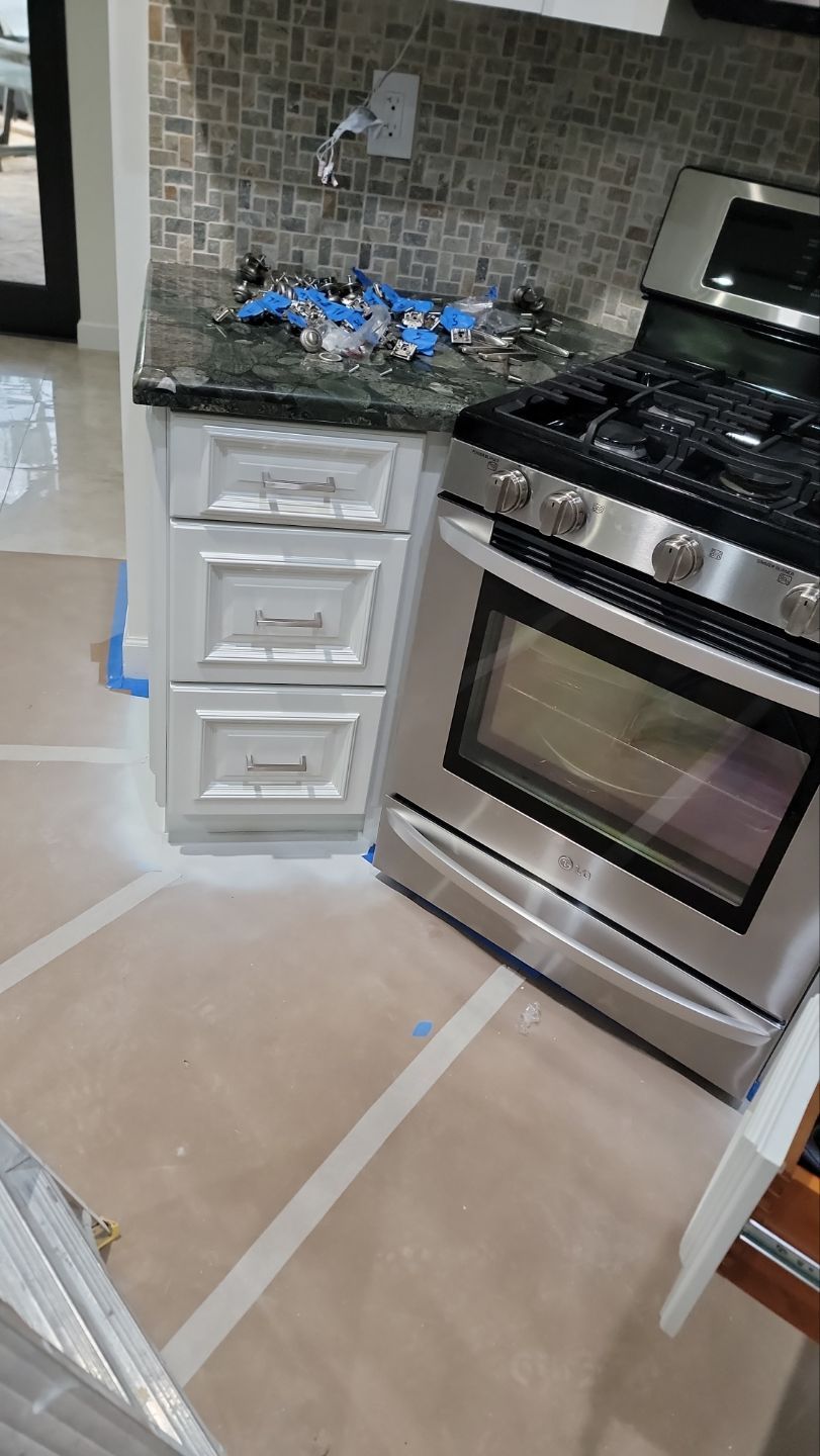 Kitchen Cabinet Just Like New by John “The Greek” Painting