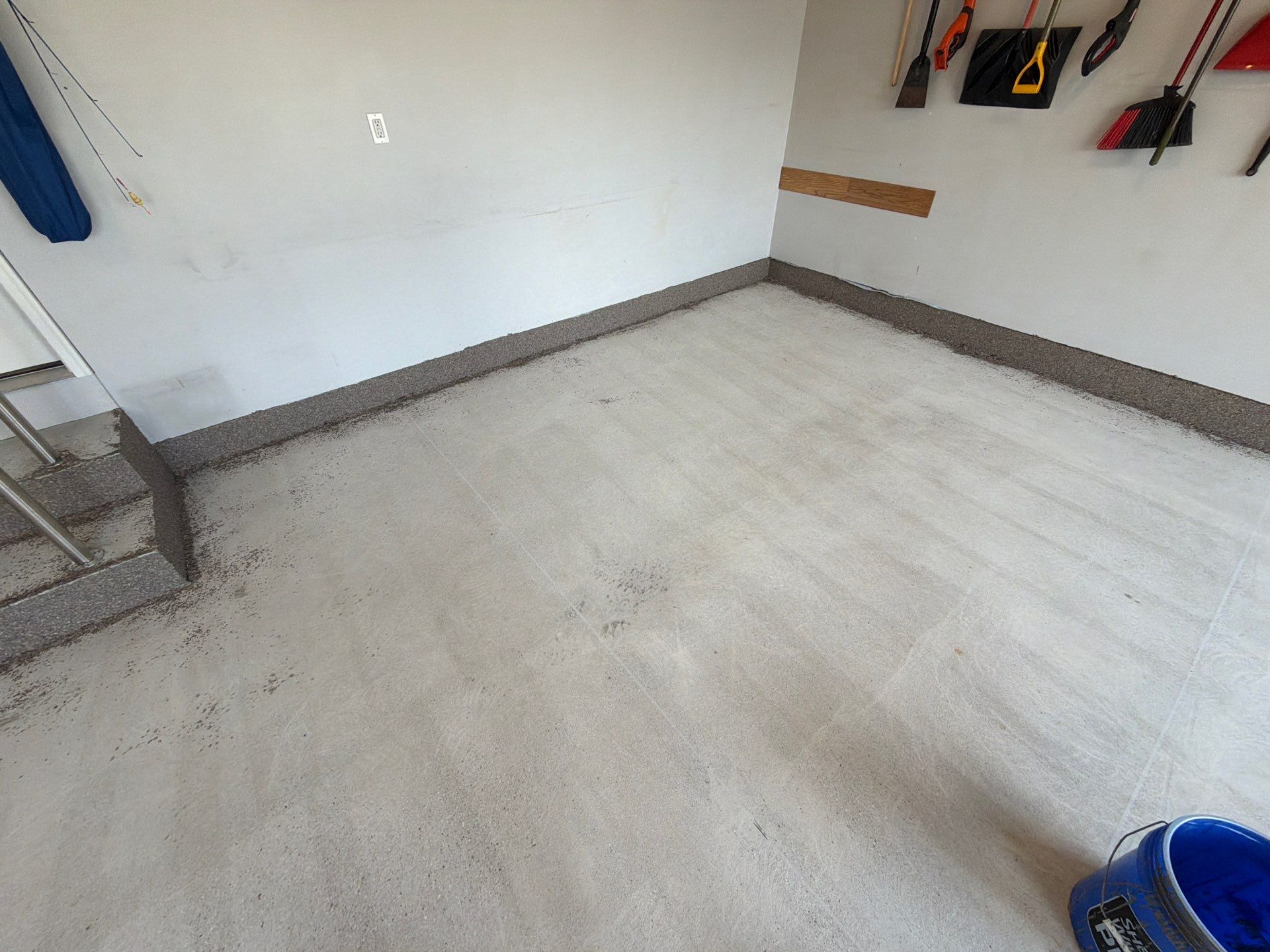 Garnet Polyaspartic Flake Garage Floor Installation in Zeeland by Gordon Painting