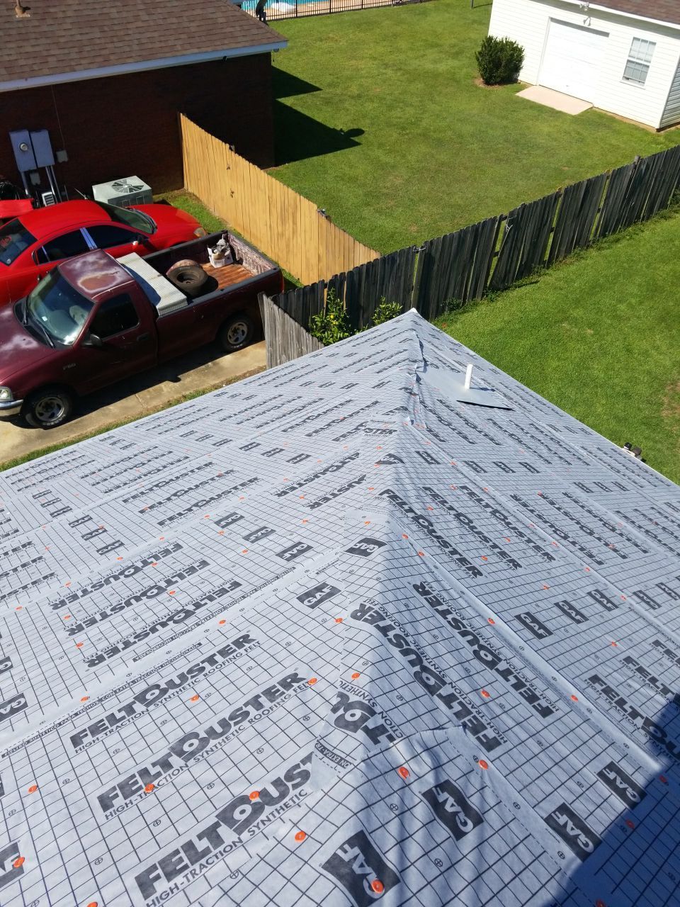 Residential Roofing Installation using Roof Replacement by American Roofing & Construction LLC