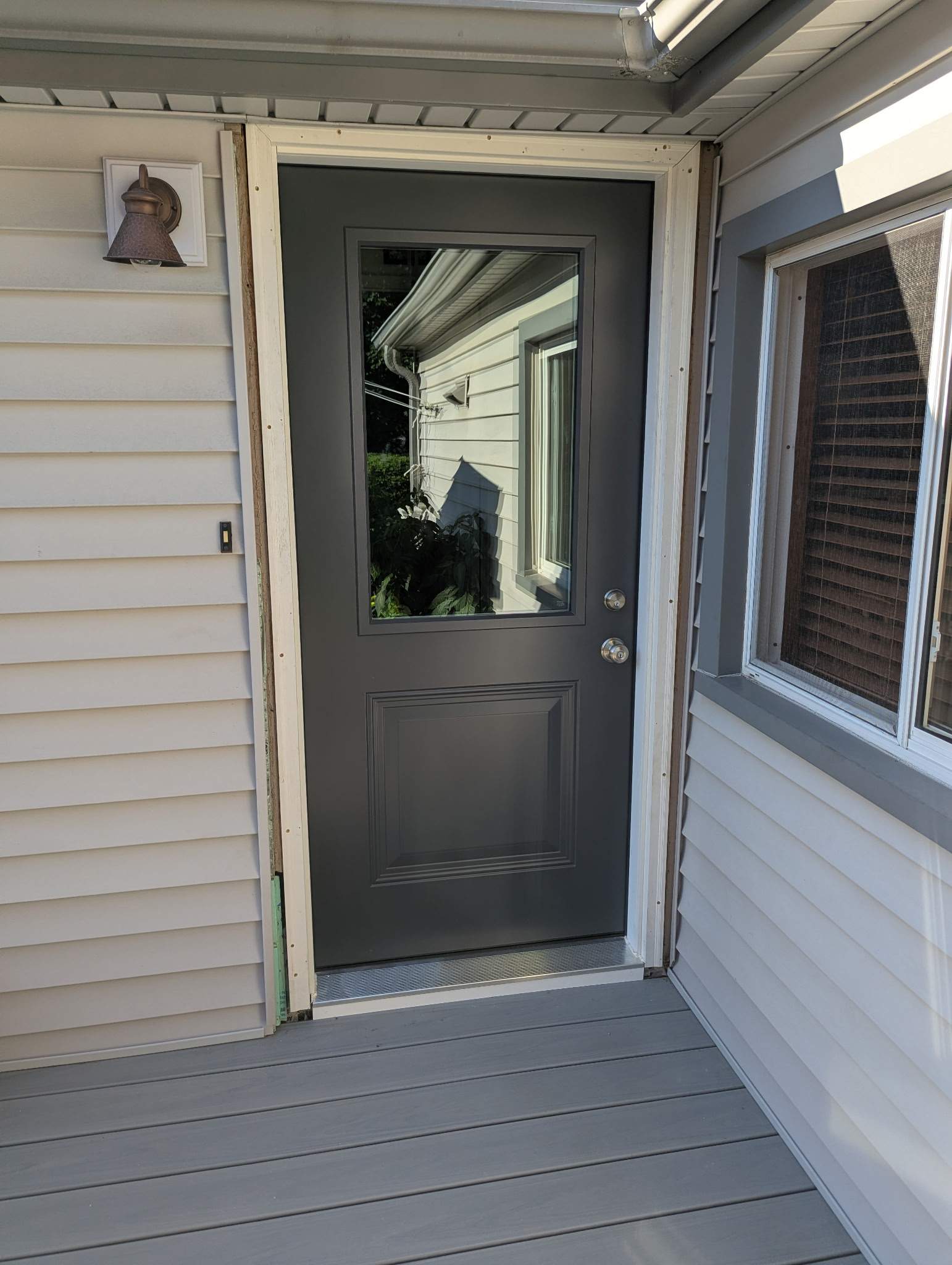 Entry Door and Storm Door Installation Using ProVia Entry Door and ProVia Storm Door by DiGiorgi Roofing and Siding Inc